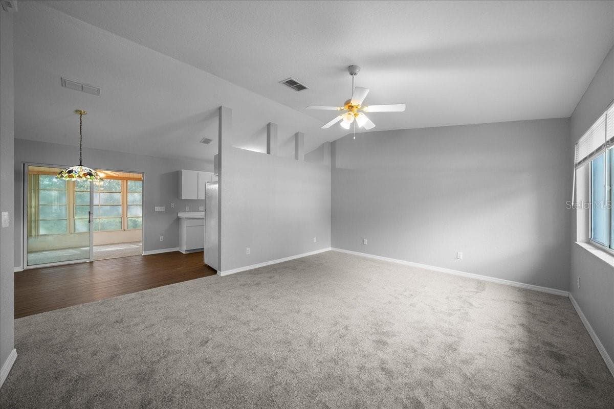 living room/dining area - 9912 SW 61ST CT, OCALA