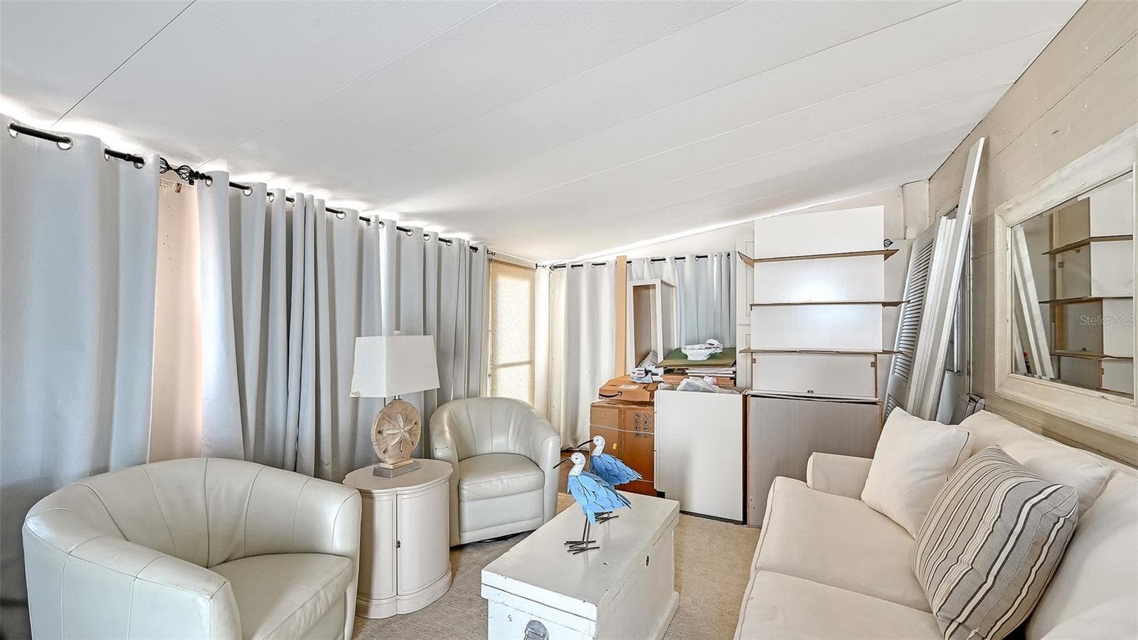Living room. Renovation materials included in sale. - 36 TWIN SHORES BLVD, LONGBOAT KEY