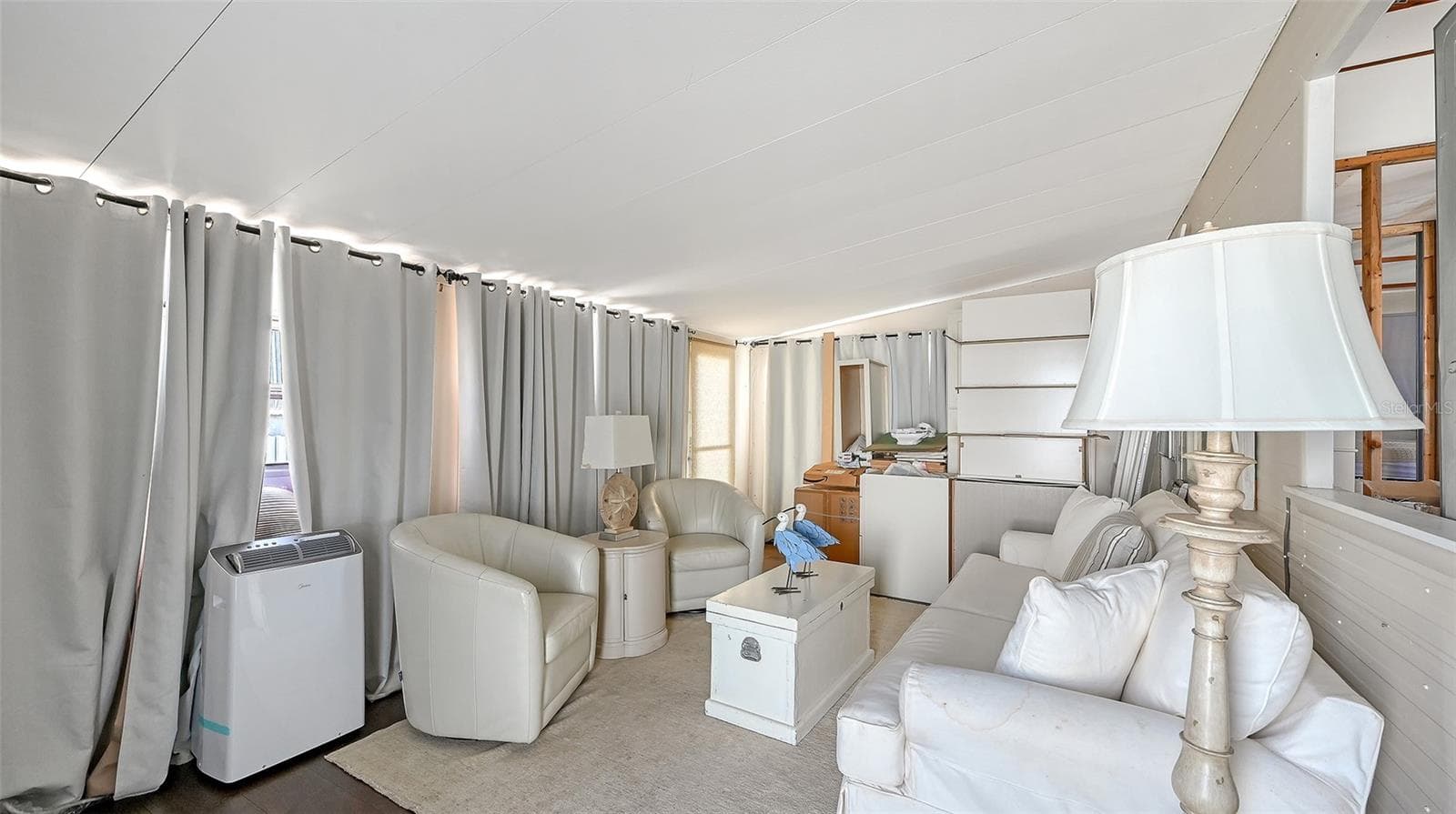 Living room. Renovation materials included in sale. - 36 TWIN SHORES BLVD, LONGBOAT KEY
