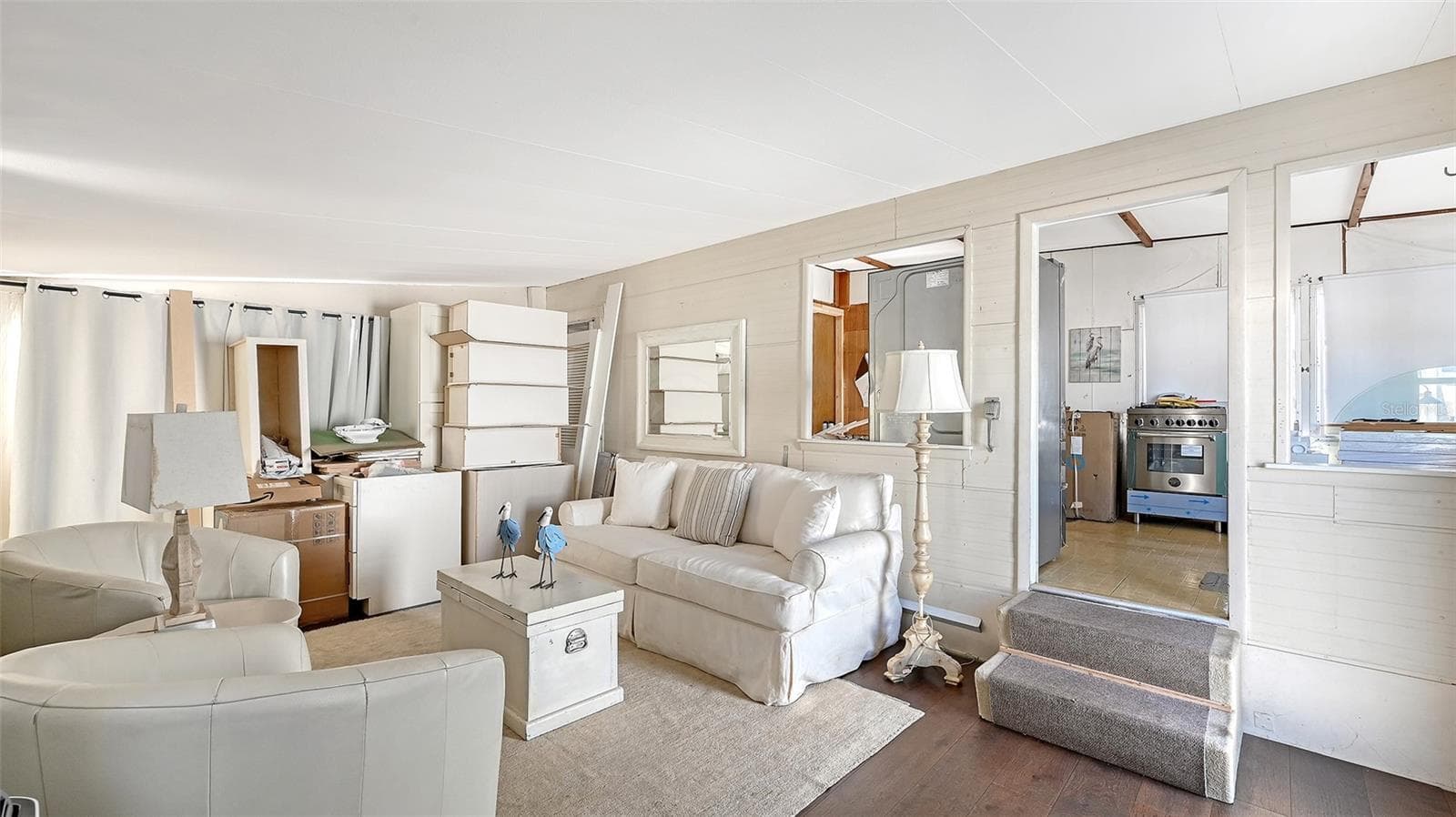 Living room + Kitchen. Flooring materials and shiplap included in sale, - 36 TWIN SHORES BLVD, LONGBOAT KEY