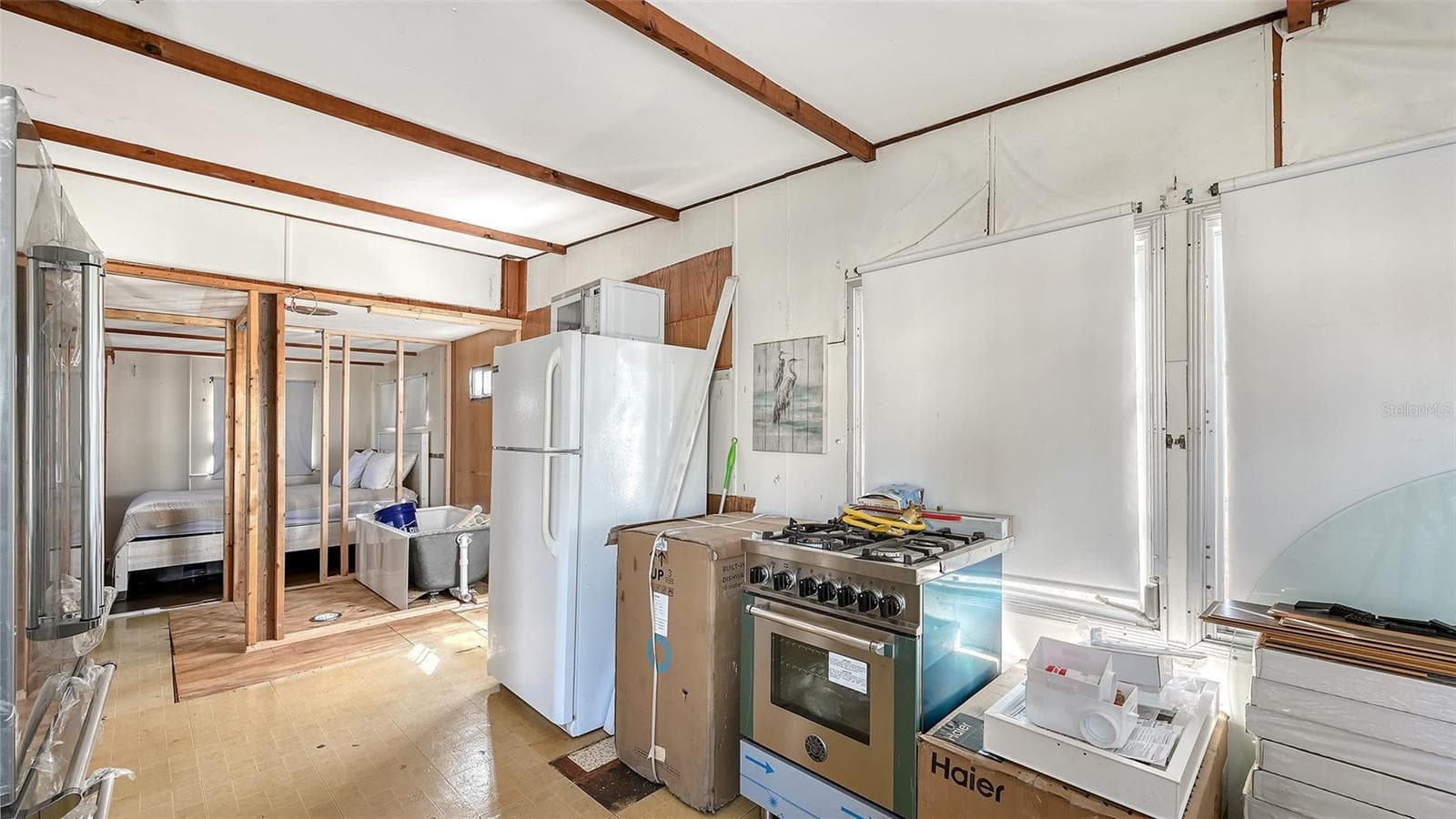Kitchen. Flooring, shiplap materials and applicances included in sale. - 36 TWIN SHORES BLVD, LONGBOAT KEY
