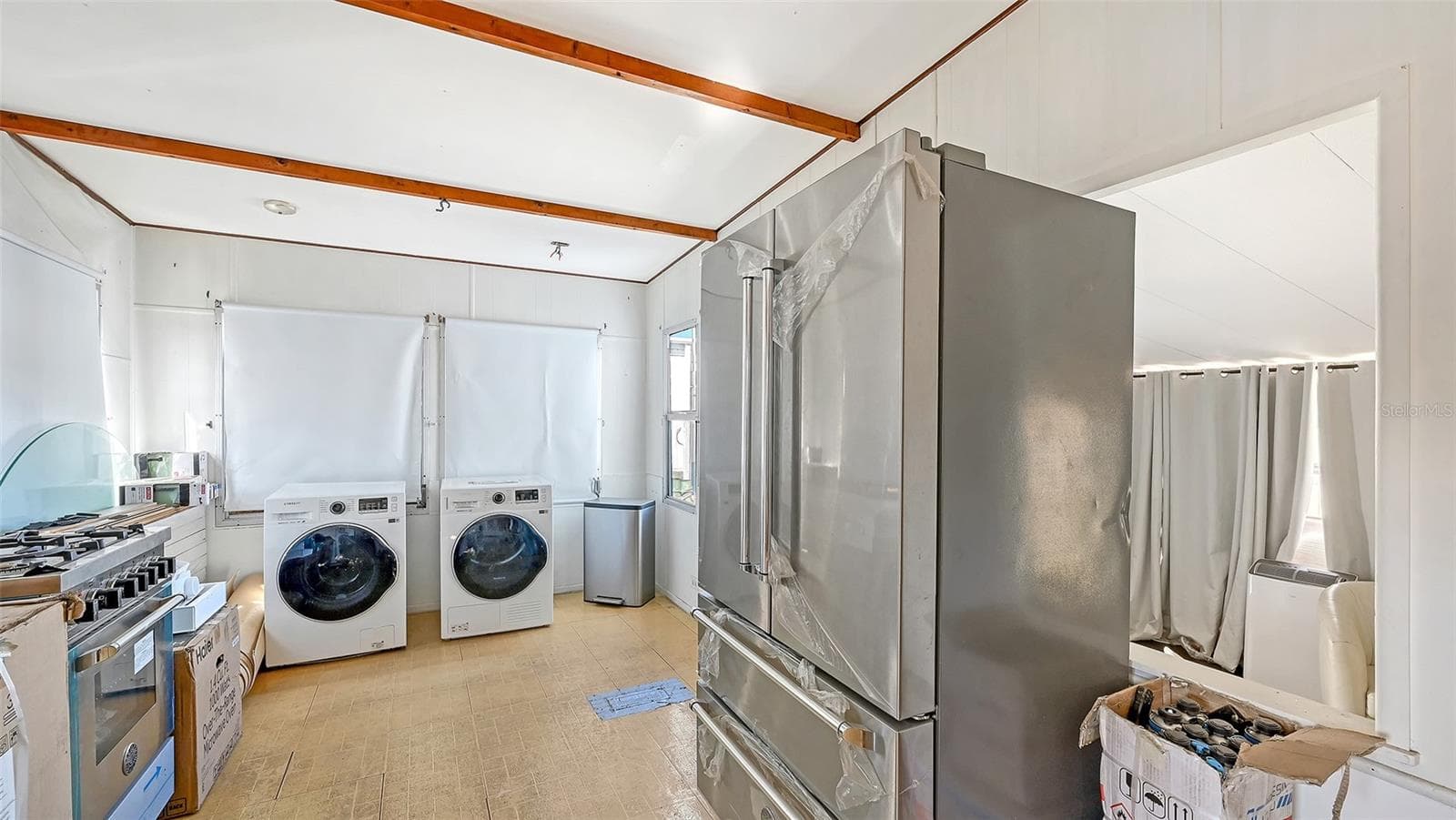 Windows (not yet installed), flooring, shiplap included in sale - 36 TWIN SHORES BLVD, LONGBOAT KEY