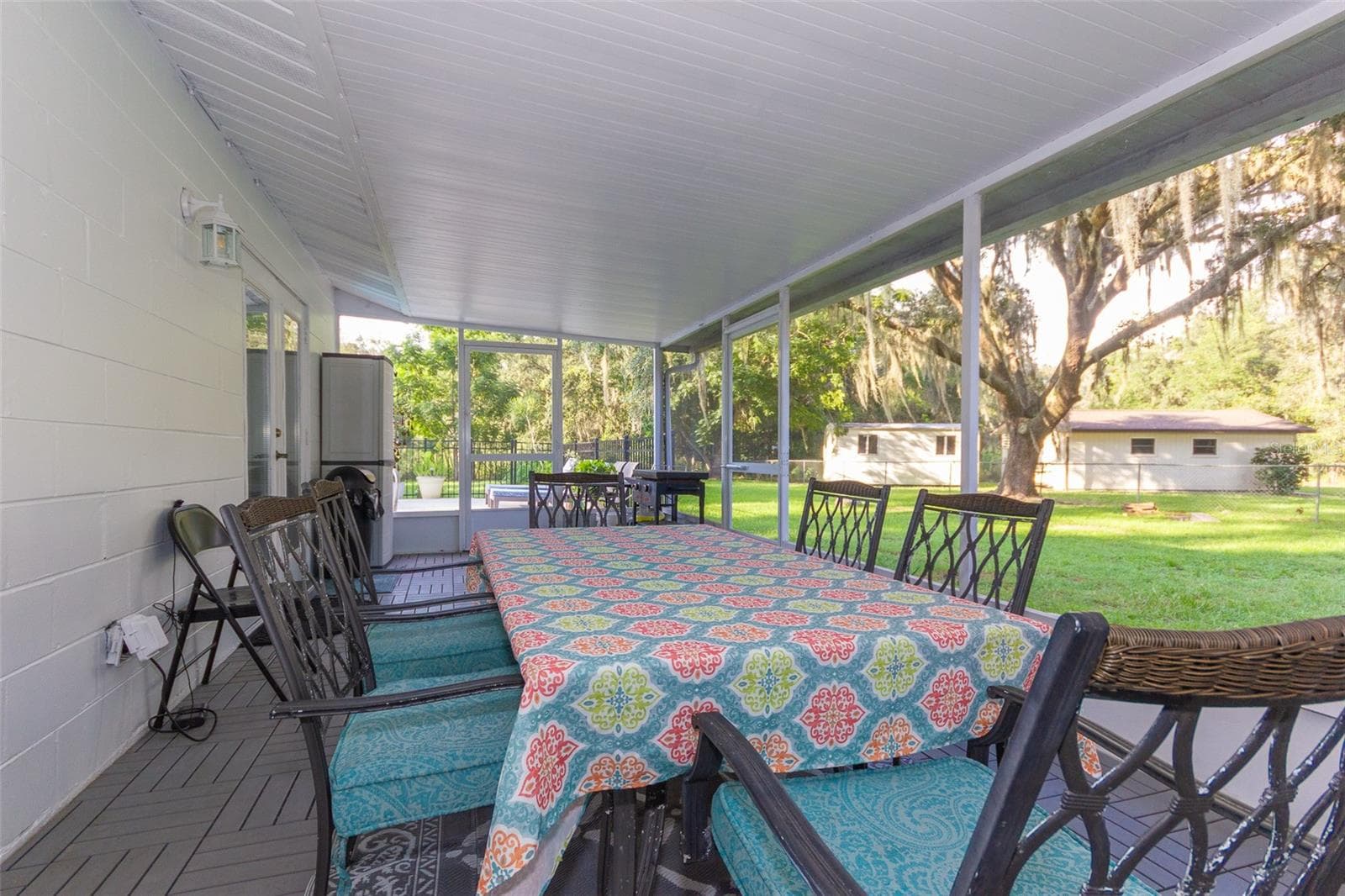 Covered lanai off the living room, leads out to pool - 12231 KELLY LN, THONOTOSASSA