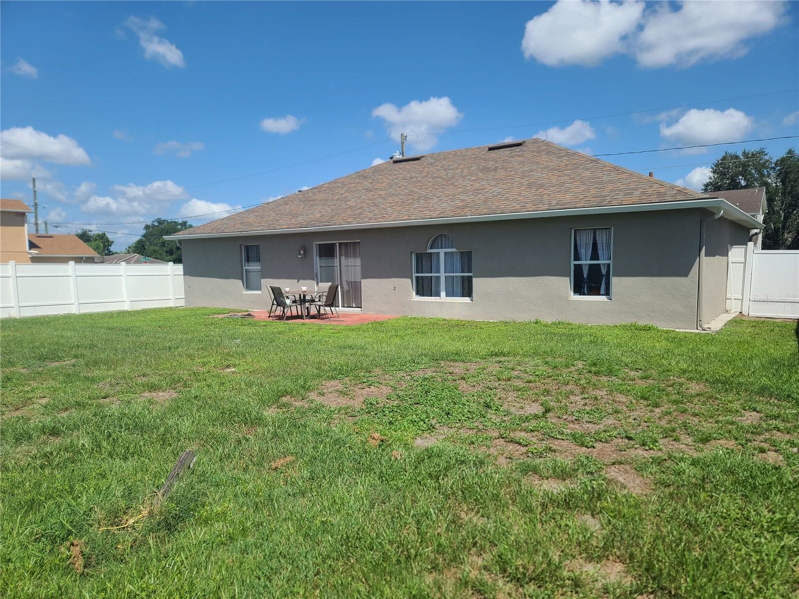 Fenced in backyard. - 149 AURORA LN, KISSIMMEE