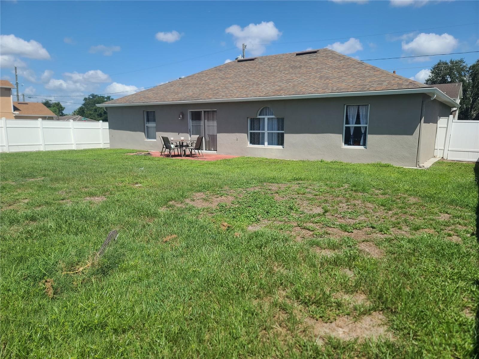 Fenced in backyard. - 149 AURORA LN, KISSIMMEE