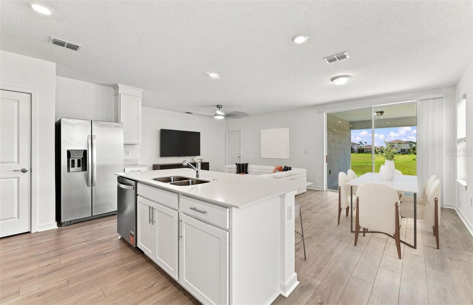 Virtually Staged - Open Kitchen to Cafe to Gathering Room - 3027 WINDSWEPT WAY, WILDWOOD