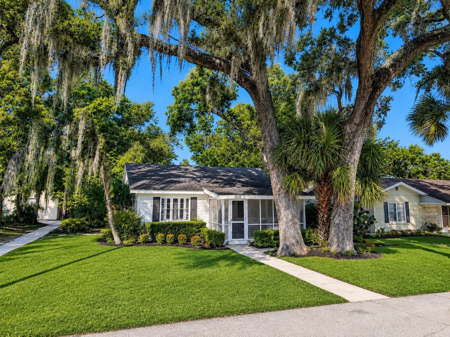 digitally enhanced to clean up landscaping - 312 HILLMAN ST, NEW SMYRNA BEACH
