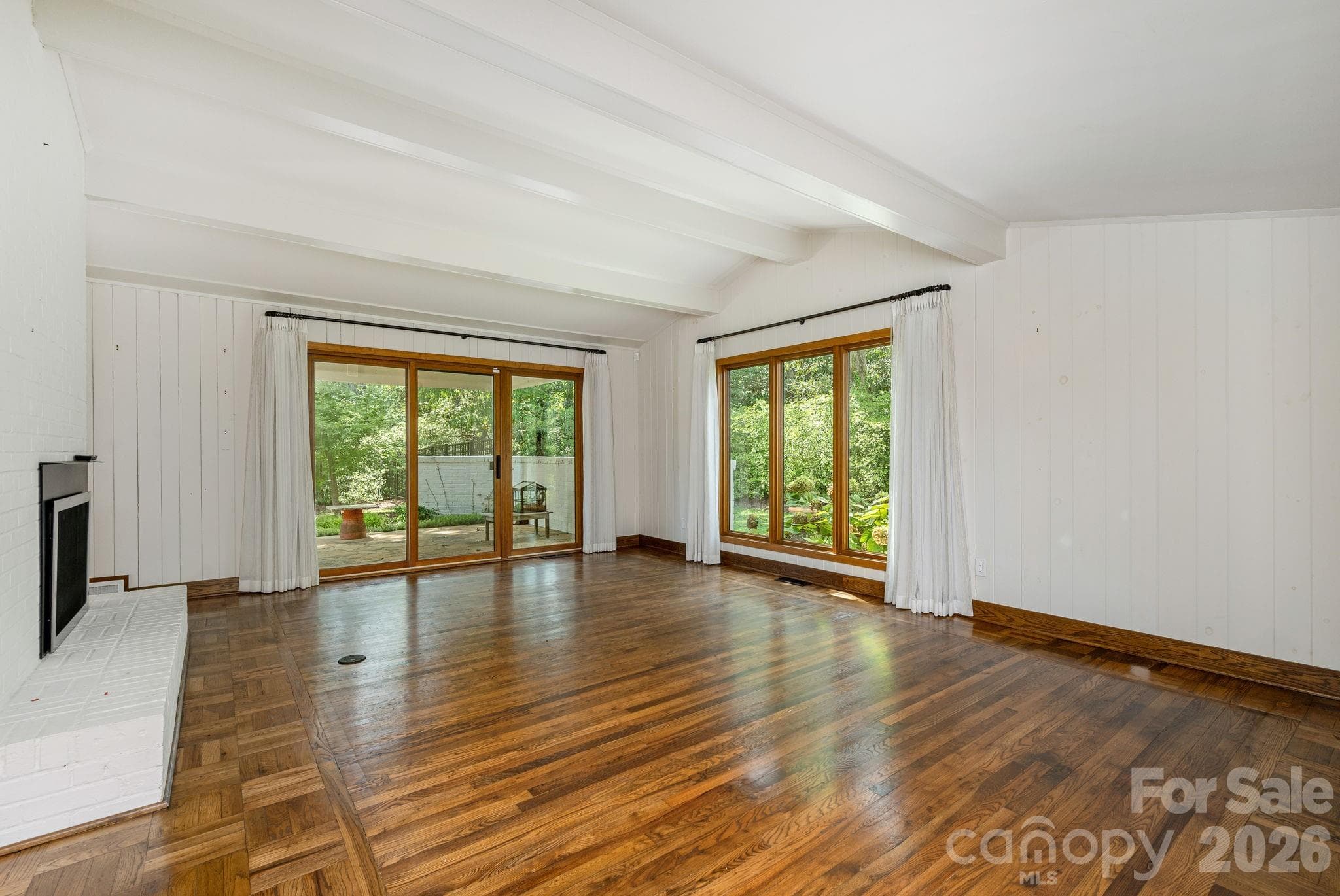 Living room with patio access - 28 Forest Road, Asheville