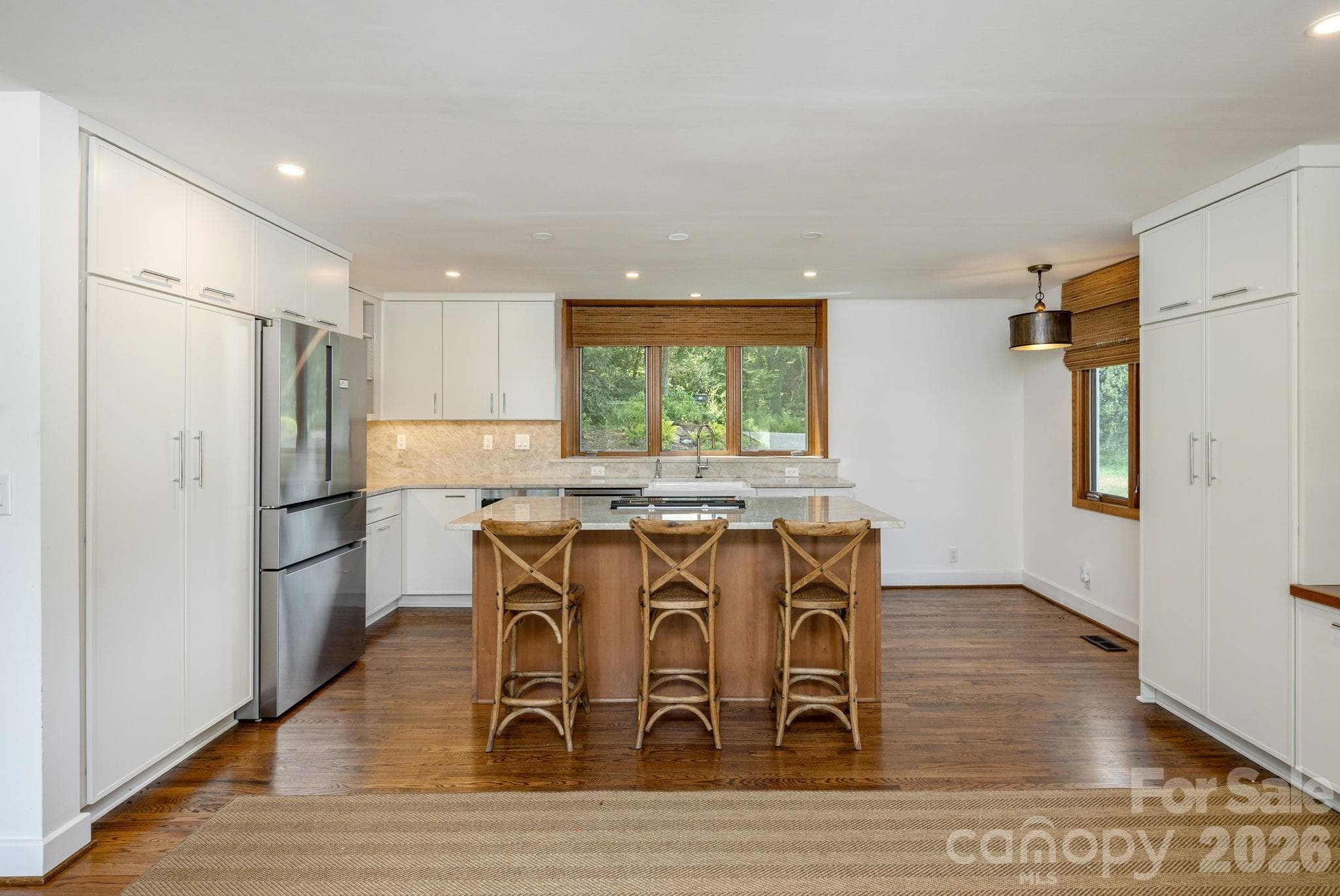 Kitchen with breakfast area by windows - 28 Forest Road, Asheville