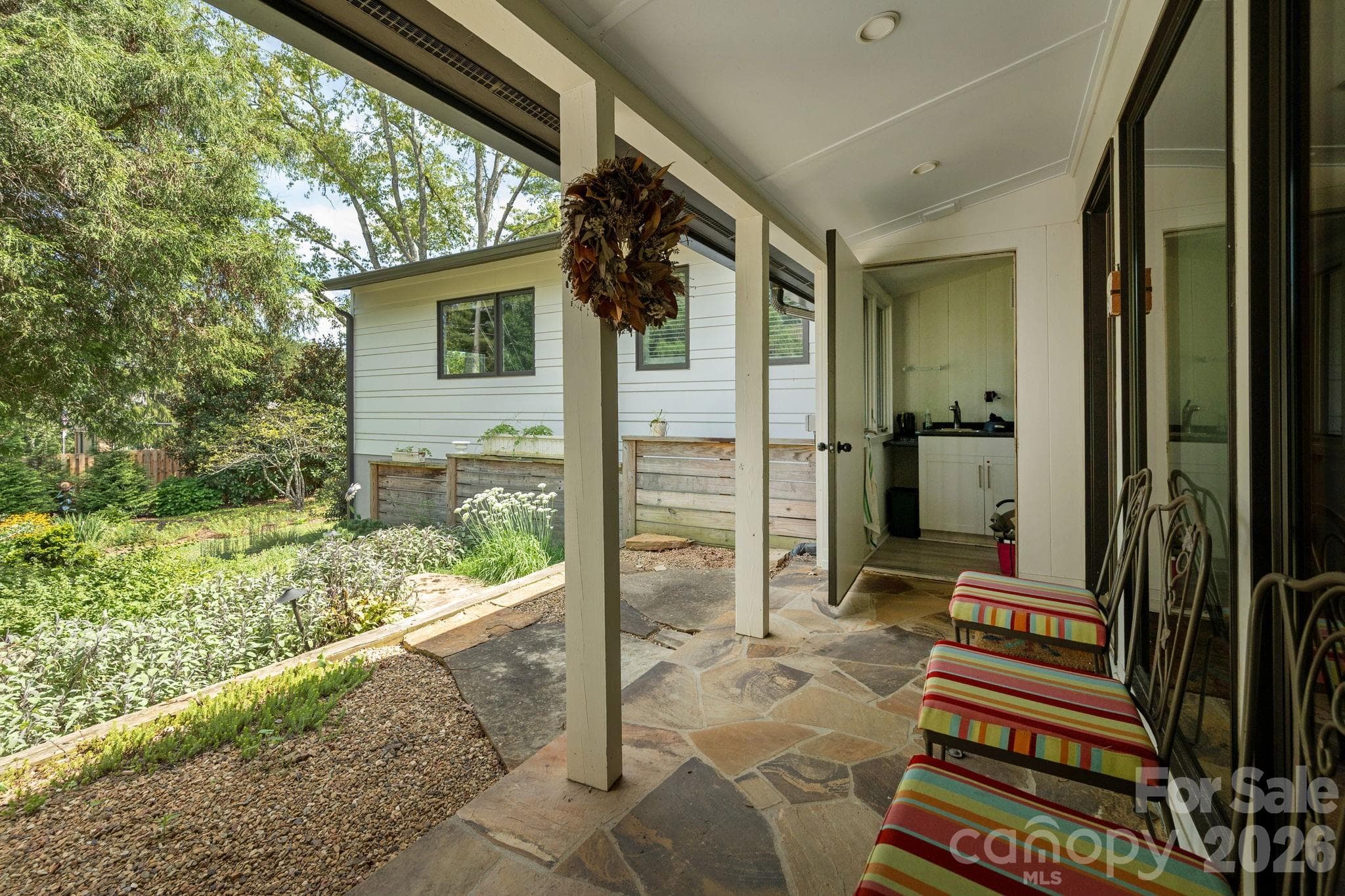 Steps from family room to the garden - 28 Forest Road, Asheville