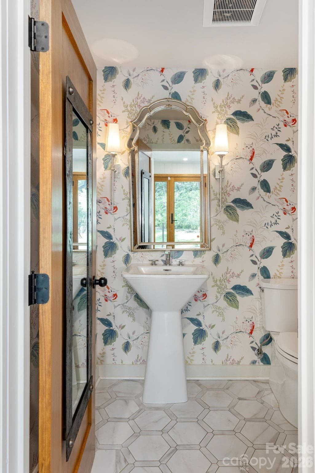 Powder room with a fabulous mirrored door - 28 Forest Road, Asheville