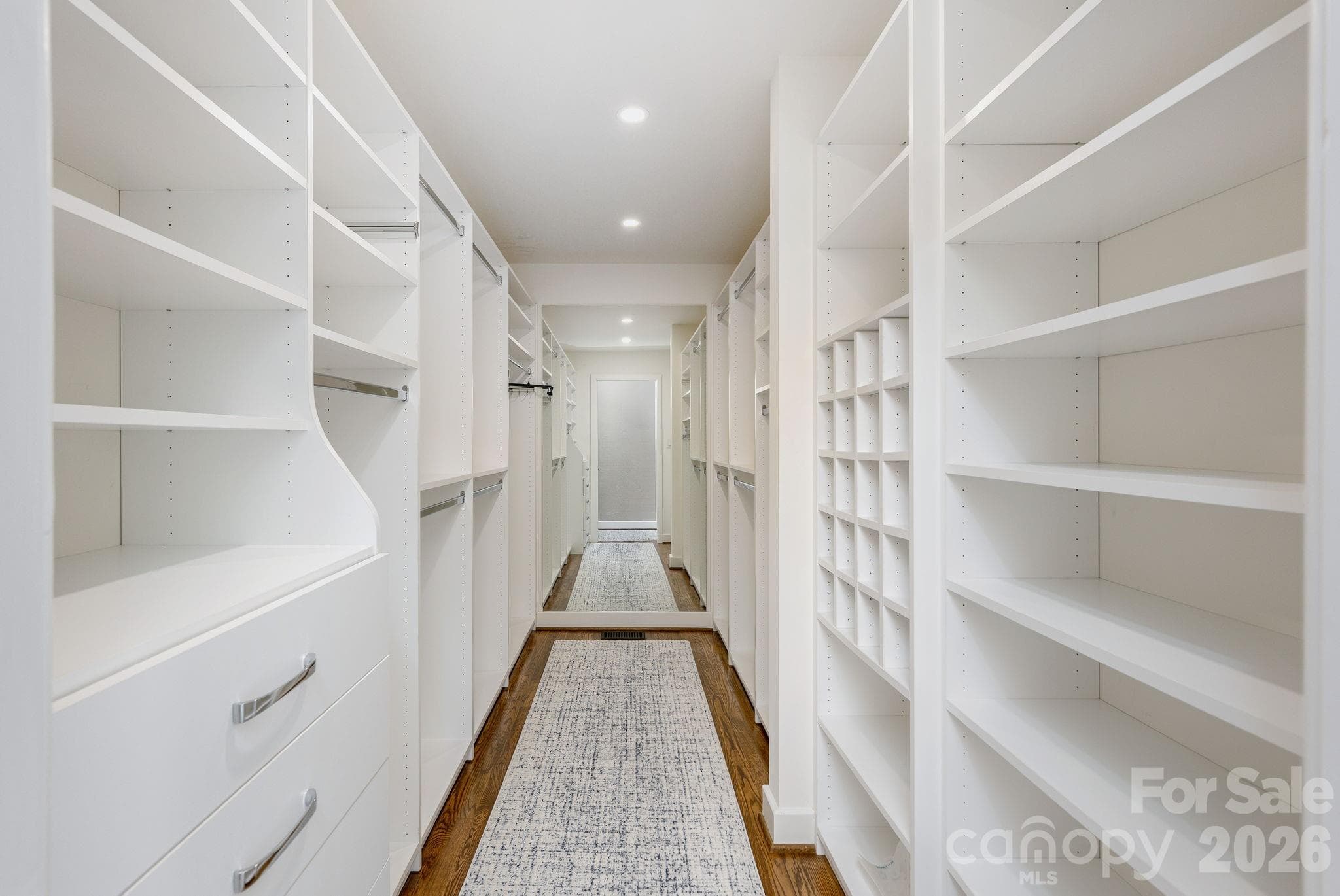 Primary closet with built-ins - 28 Forest Road, Asheville