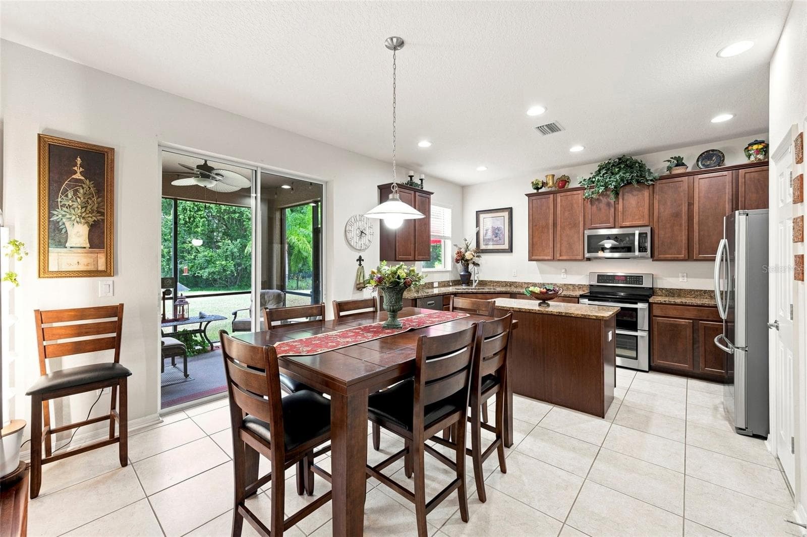 Open Dining & Kitchen Area - 11245 BELLE HAVEN DR, NEW PORT RICHEY