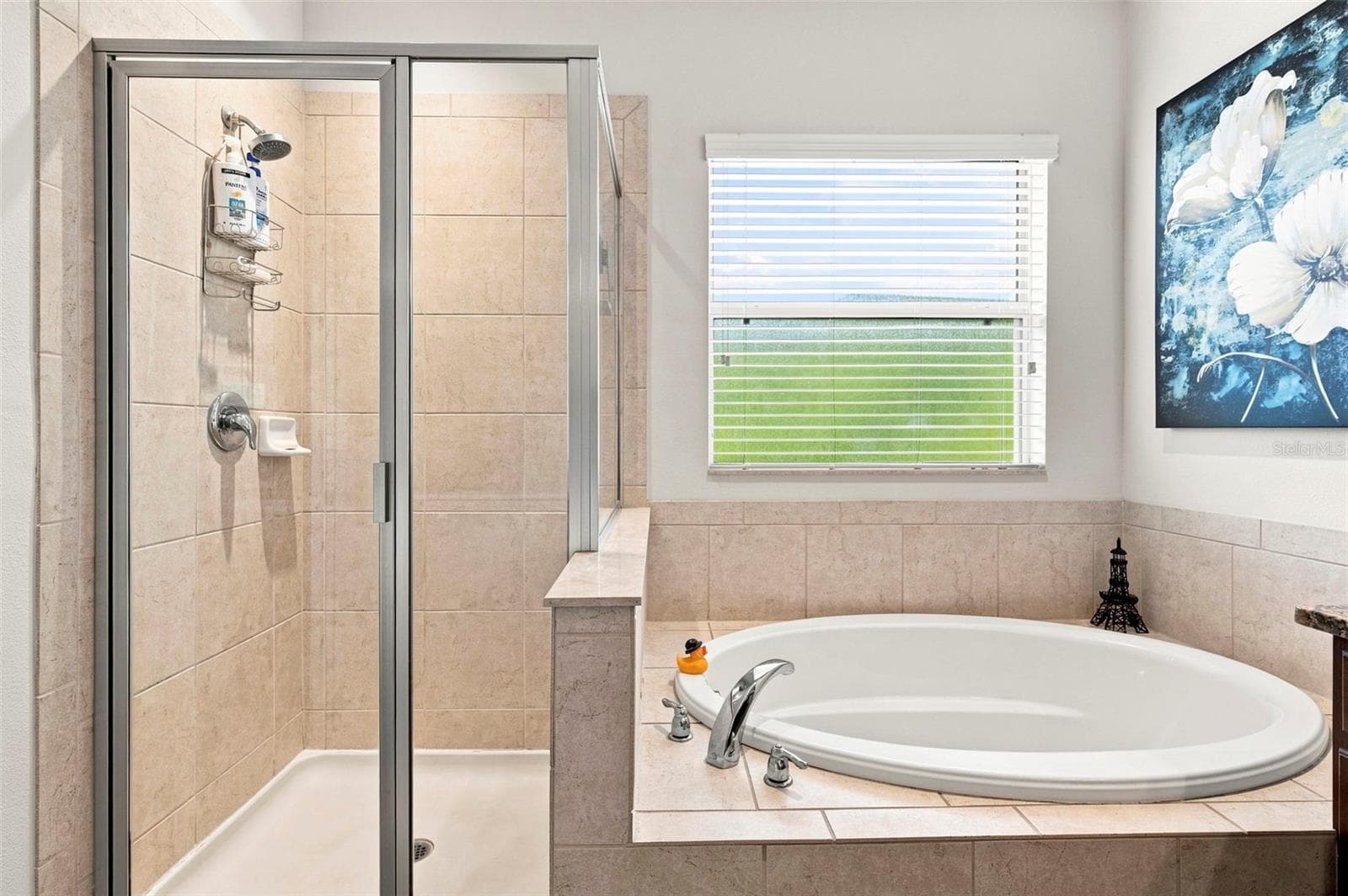 Primary Walk-In Shower and Garden Tub - 11245 BELLE HAVEN DR, NEW PORT RICHEY