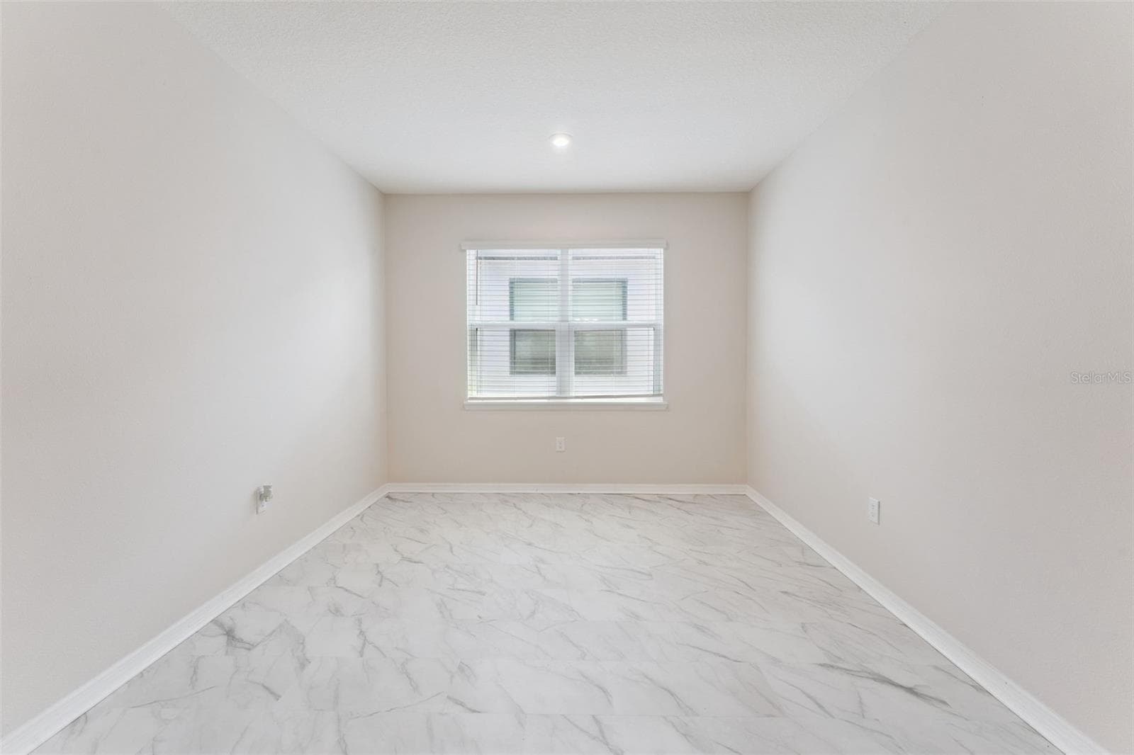 Upstairs Loft – Alternate view showcases the loft’s generous proportions and natural light, offering plenty of flexibility for a second living area, media space, or home workspace. - 1287 VERDANT GLADE PL, WINTER PARK