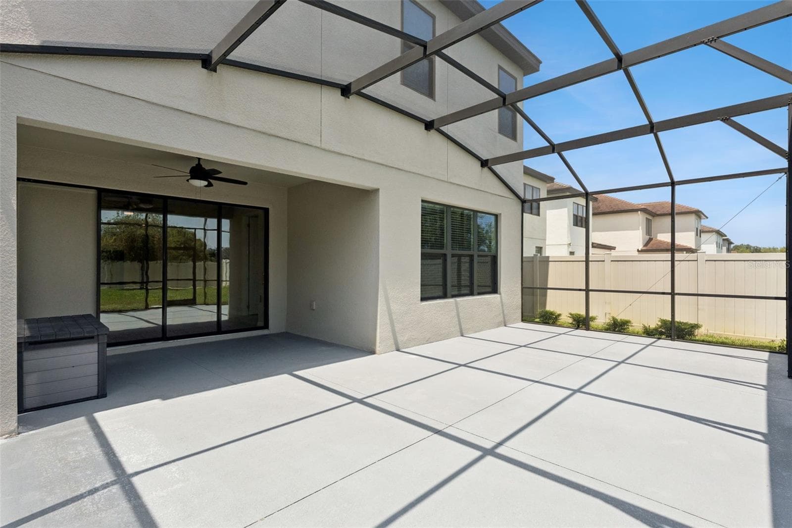 Screened Outdoor Living – Spacious screened patio offers a generous covered area with direct access to the interior and plenty of room for outdoor seating and dining. - 1287 VERDANT GLADE PL, WINTER PARK