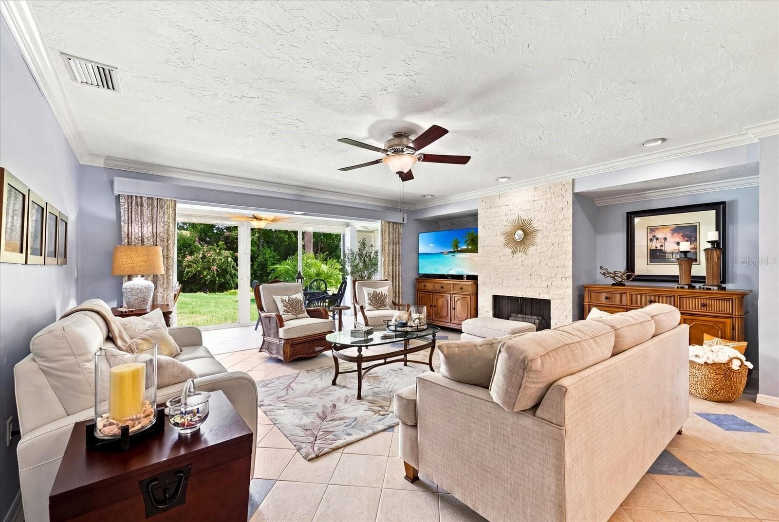 Beautiful, timeless updates throughout. Fireplace has a stunning stacked stone surround finish. Lovely, serene views overlooking green space. - 3252 RINGWOOD MDW #81, SARASOTA
