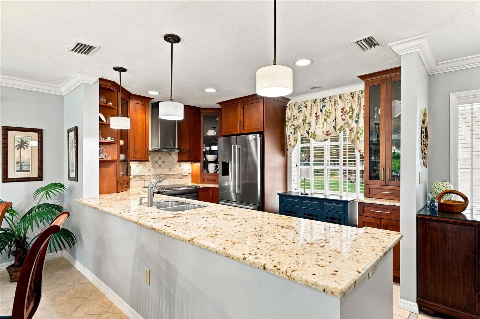 Easy to entertain, host and stay part of the action with this open layout kitchen. - 3252 RINGWOOD MDW #81, SARASOTA