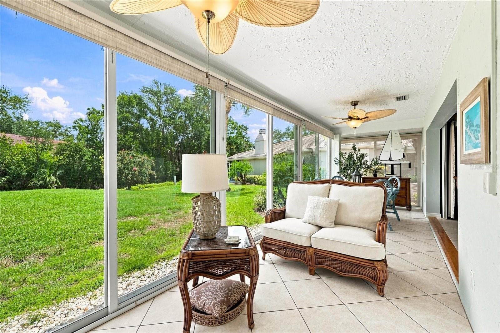 Oversized Florida sunroom is enclosed and has AC. Enjoy the extra space! Add a daybed and enjoy afternoon naps. - 3252 RINGWOOD MDW #81, SARASOTA