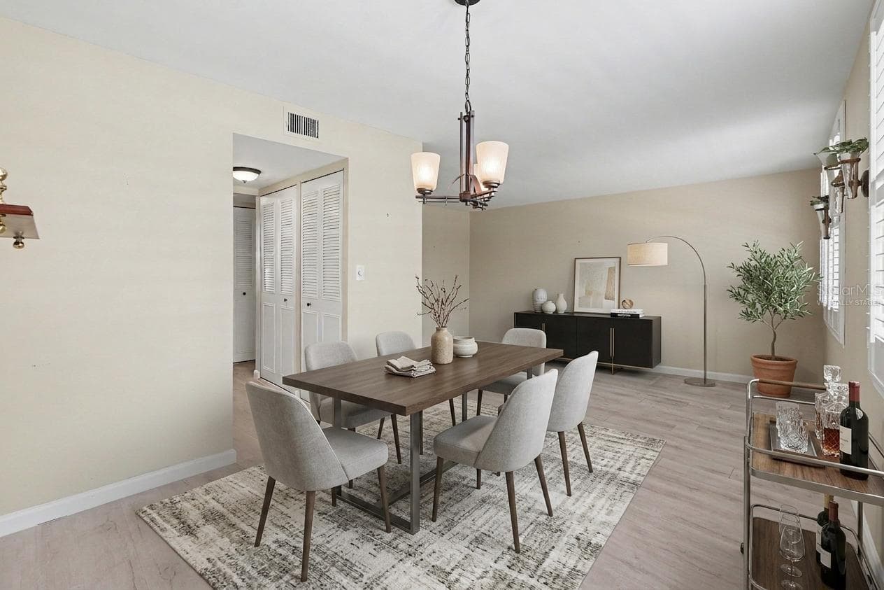 Virtually Staged - Dining Area - 4720 LOCUST ST NE #206, ST PETERSBURG