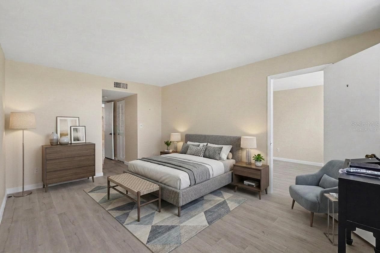 Virtually Staged - Primary Bedroom - 4720 LOCUST ST NE #206, ST PETERSBURG