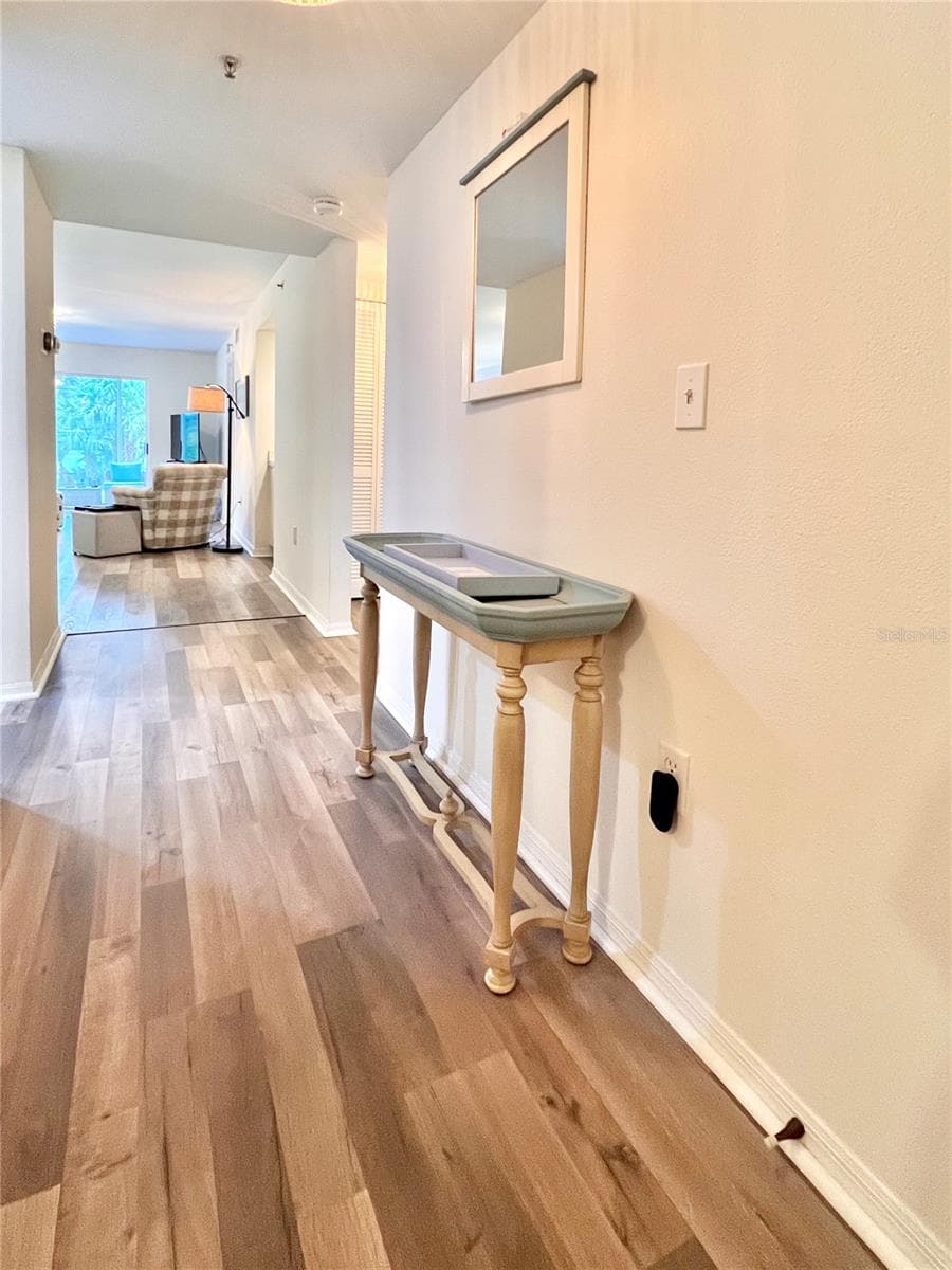 Entering the front door gives immediate views out back. - 6501 STONE RIVER RD #104, BRADENTON