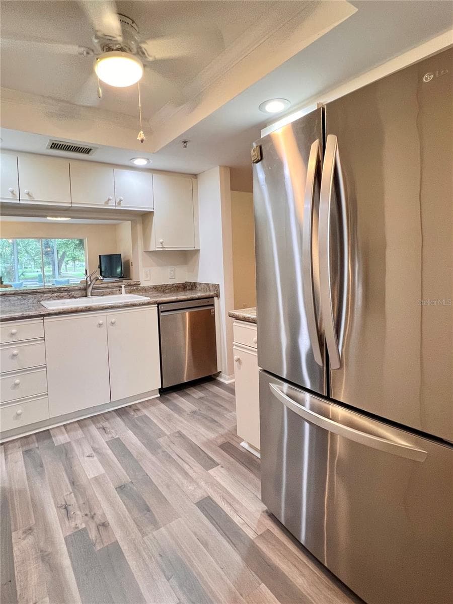 Stainless appliances in the kitchen - 6501 STONE RIVER RD #104, BRADENTON