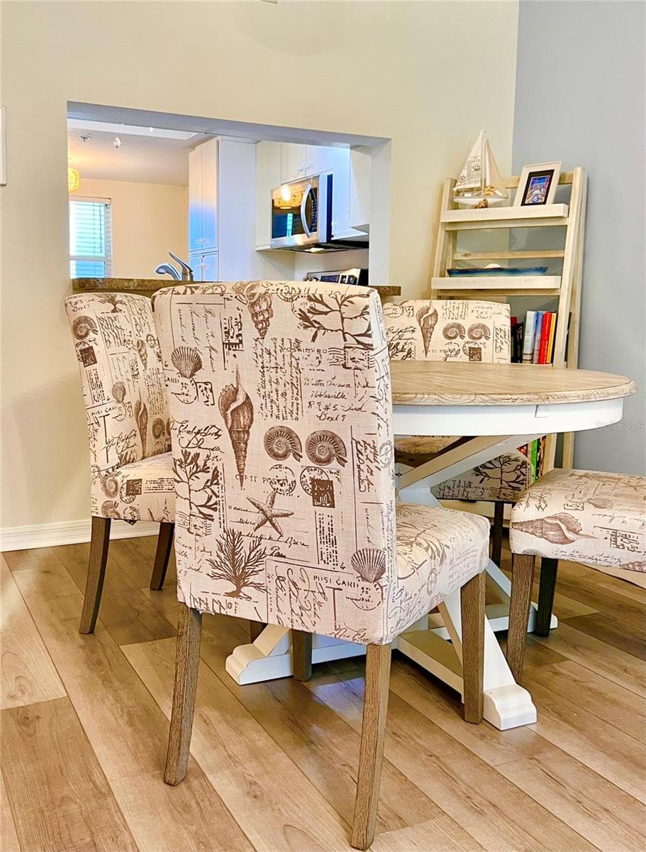 Dining room is open to the kitchen as well - 6501 STONE RIVER RD #104, BRADENTON