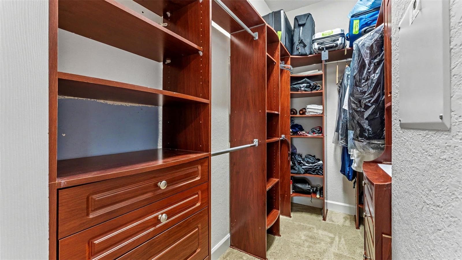 Primary bedroom walk in closet - 1230 MOTORCOACH DR, POLK CITY