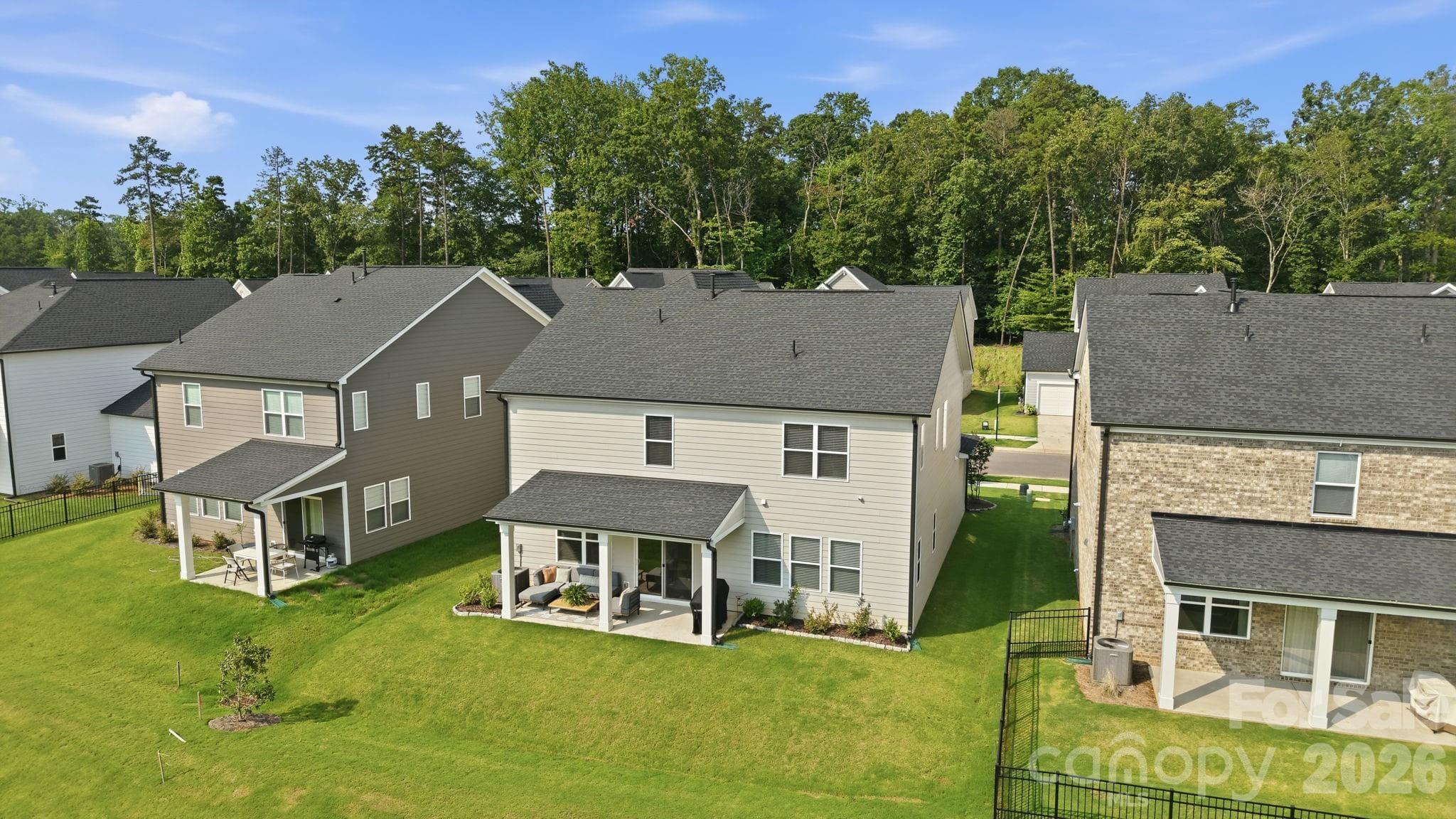 Oversized covered outdoor living space could likely be easily screened - 8226 Franklin Trail Street, Mint Hill