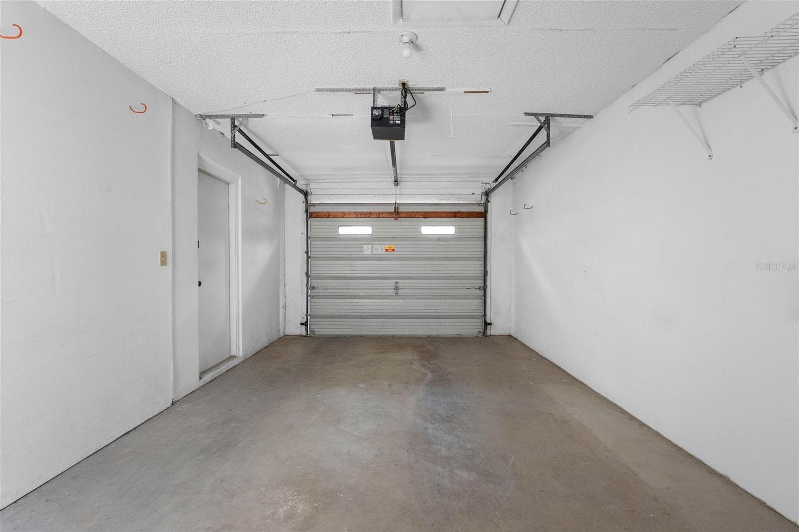1-Car Garage with opener - 2833 ORANGE TREE CIR N #A, PALM HARBOR