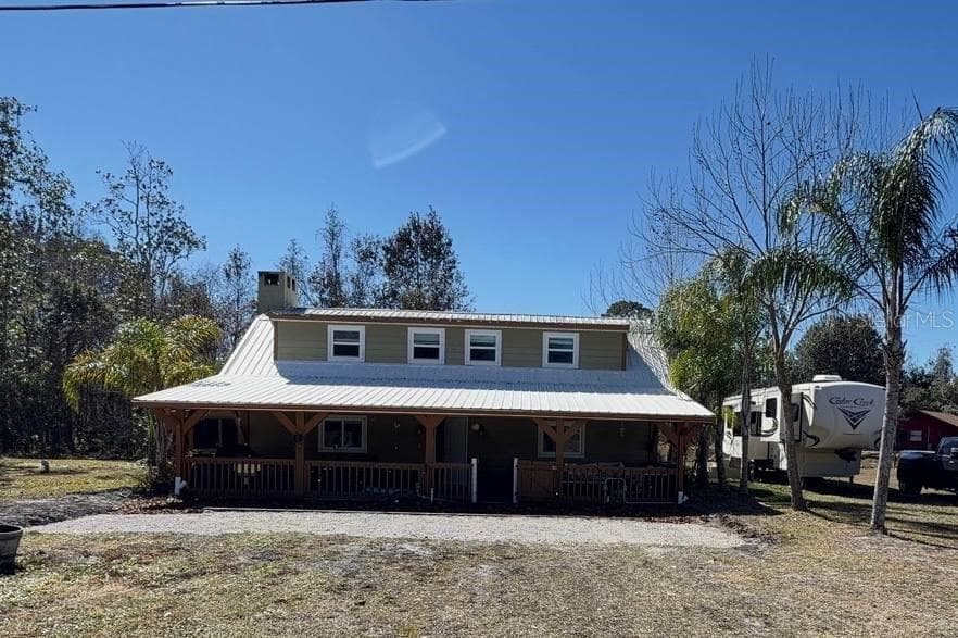 Single Family Residence at 445 S STATE ROAD 415, OSTEEN, photo 2 of 29