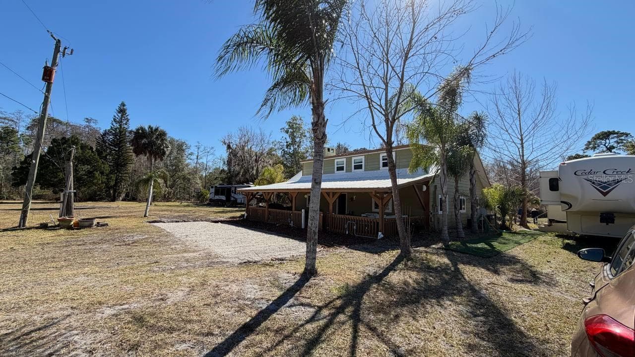 Single Family Residence at 445 S STATE ROAD 415, OSTEEN, photo 4 of 29
