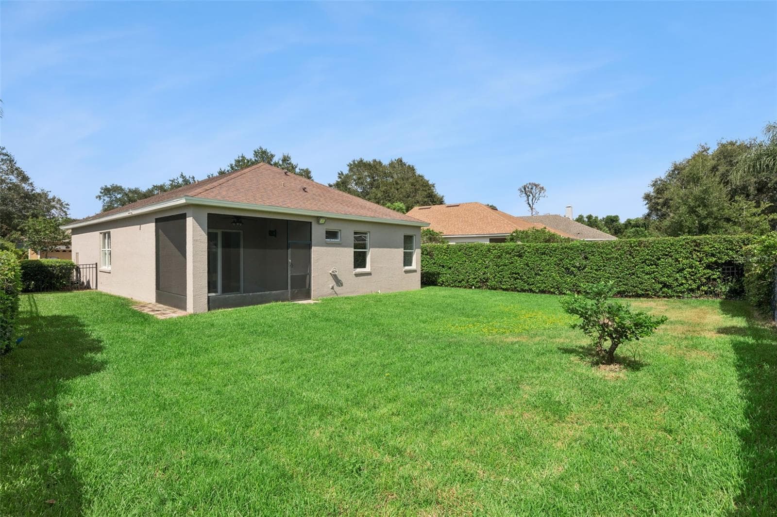 New (2026) sod and covered screened patio. - 1206 CHESSINGTON CIR, LAKE MARY