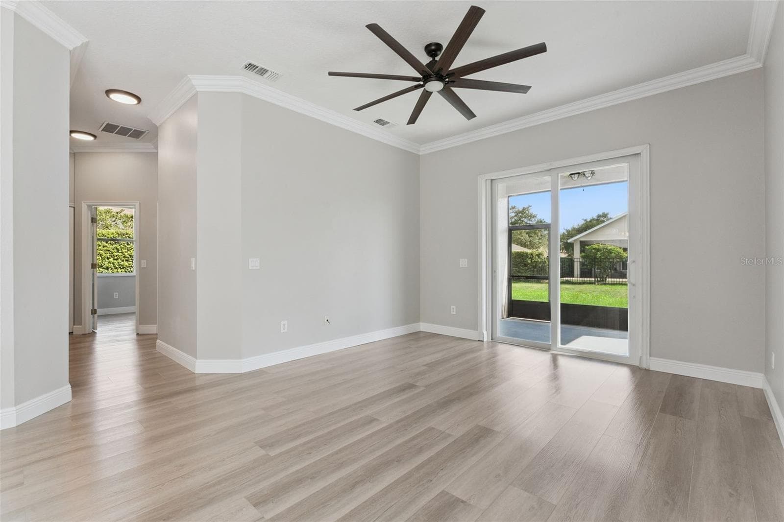 View from family room towards the hall to bedrooms. - 1206 CHESSINGTON CIR, LAKE MARY
