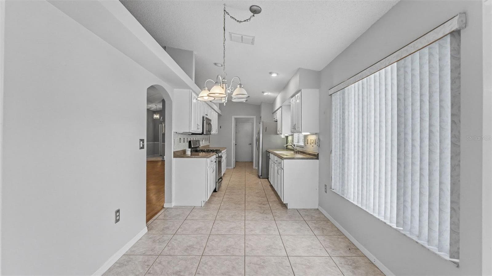 Dinette and kitchen - 2191 SILVER RE DR, LAKELAND