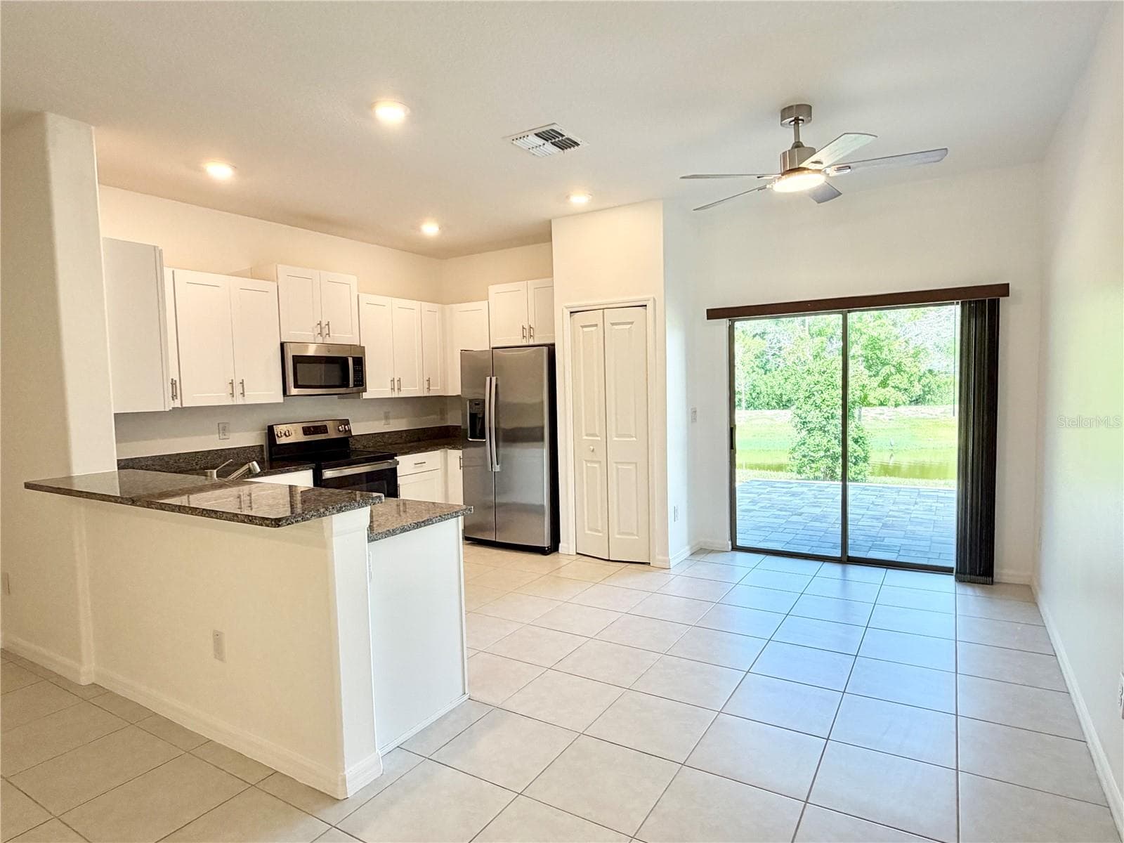 Dining and Kitchen - 2578 CHARLAN CT, HOLIDAY