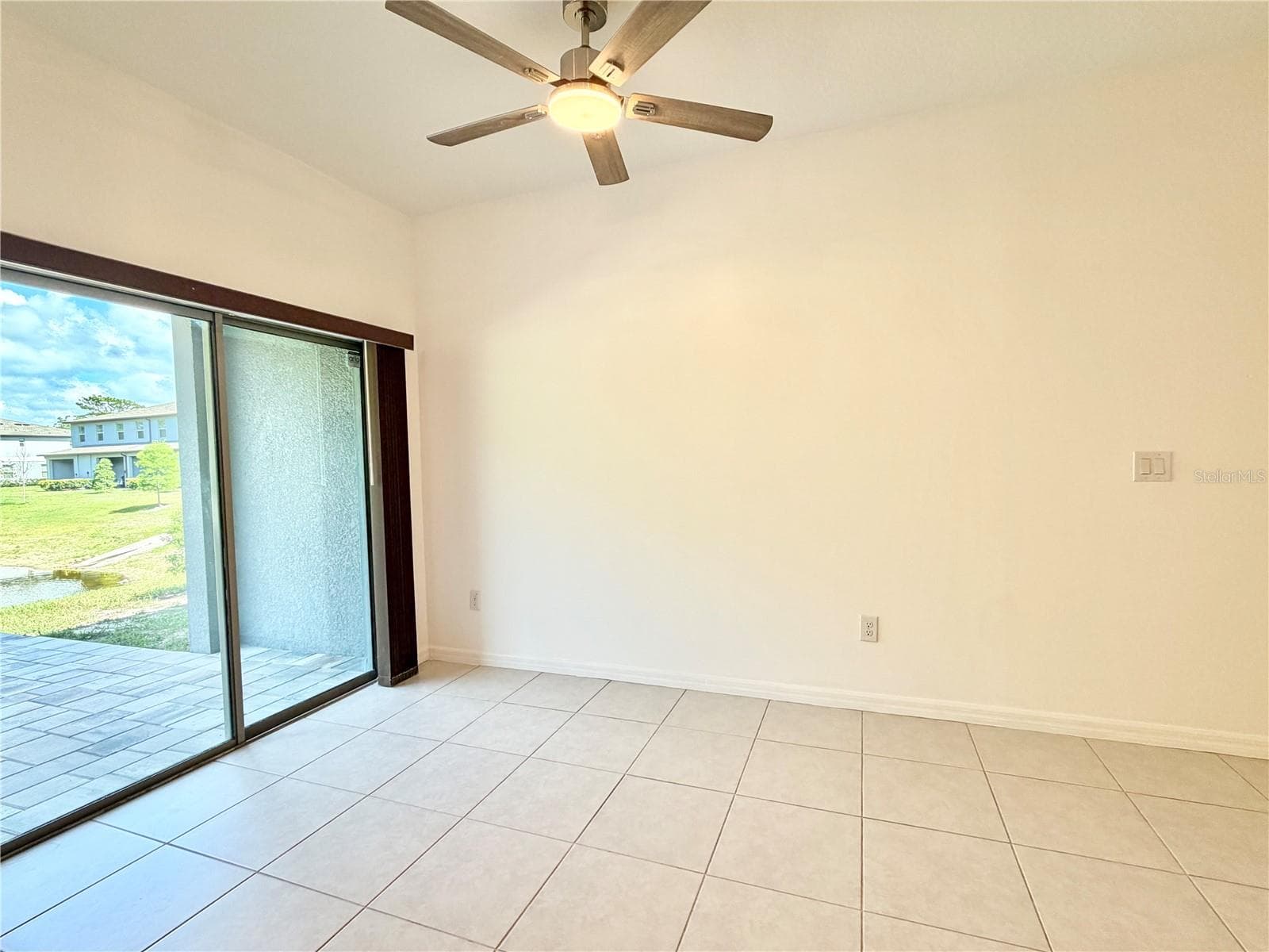 Dining with sliding door access to WATERFRONT back covered patio - 2578 CHARLAN CT, HOLIDAY
