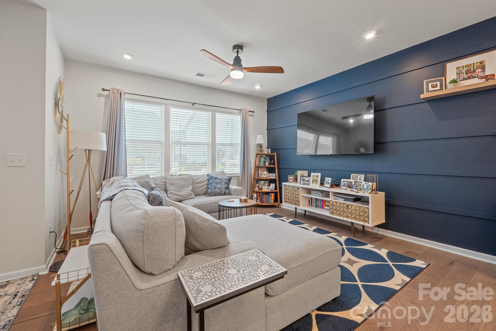Family room with ceiling fan - 6161 Pierce Lane, Kannapolis