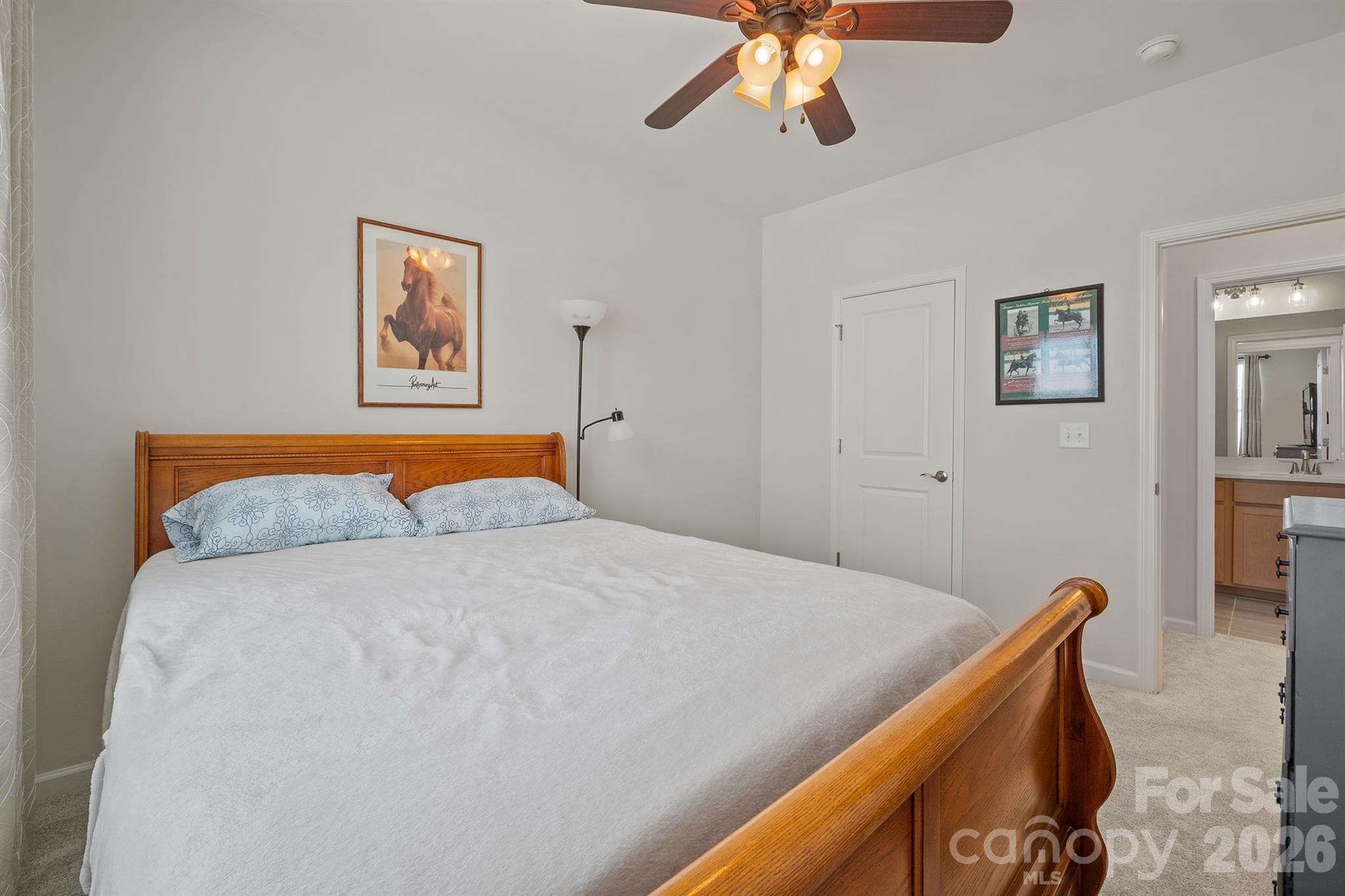 Bedroom 2 with ceiling fan and walk in closet - 6161 Pierce Lane, Kannapolis