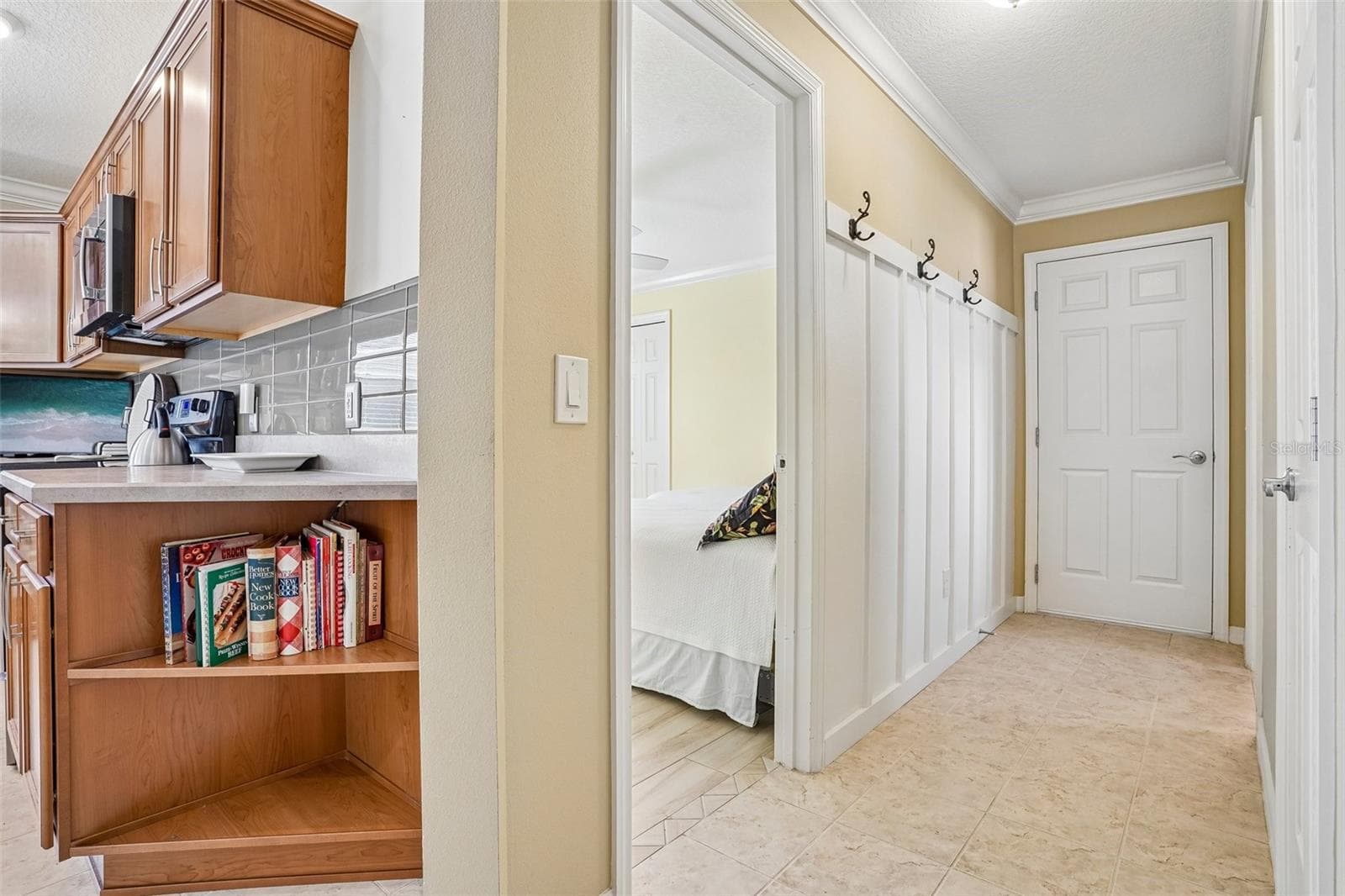 Hallway to Garage, 2nd Bath, 3rd Bedroom - 583 ARTEAGA WAY, THE VILLAGES