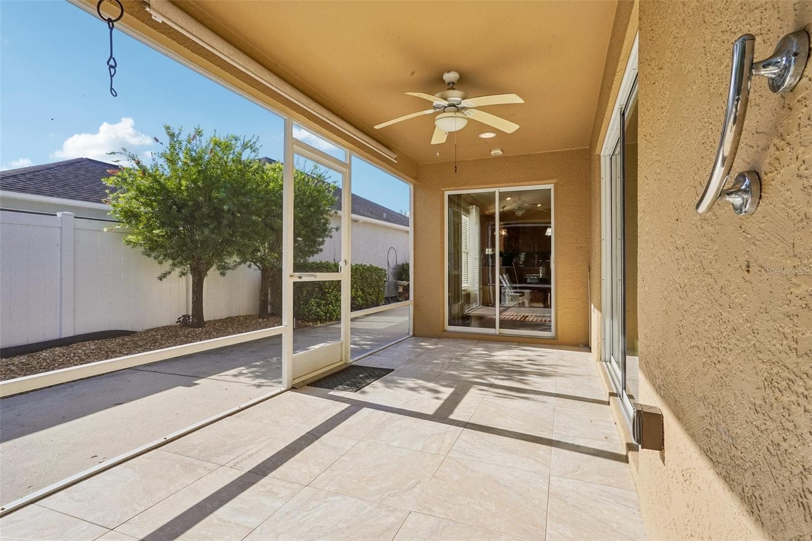 Half of the Enclosed Lanai - 583 ARTEAGA WAY, THE VILLAGES