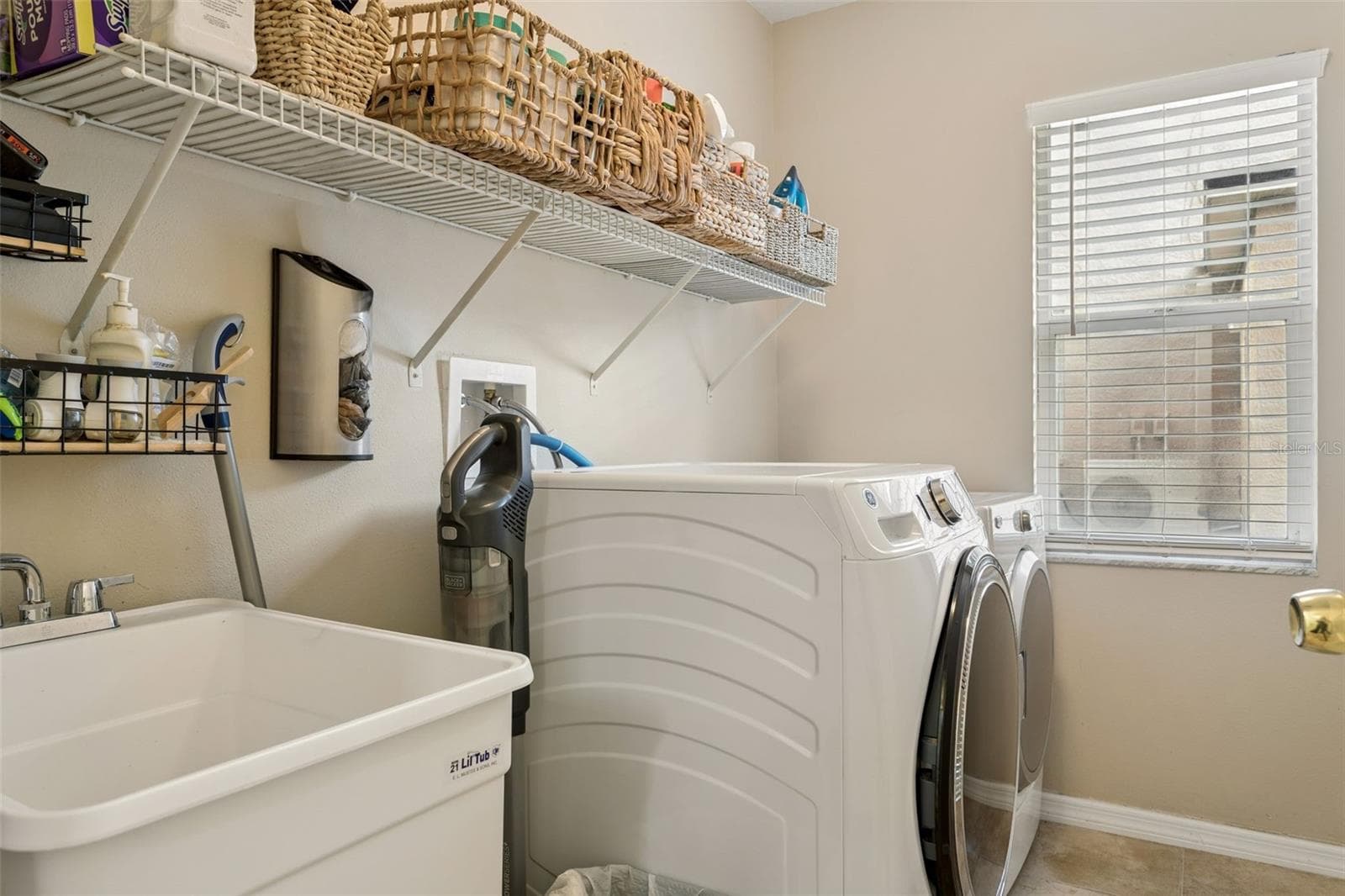 Dedicated laundry room. - 15611 SHOAL CREEK PL, ODESSA