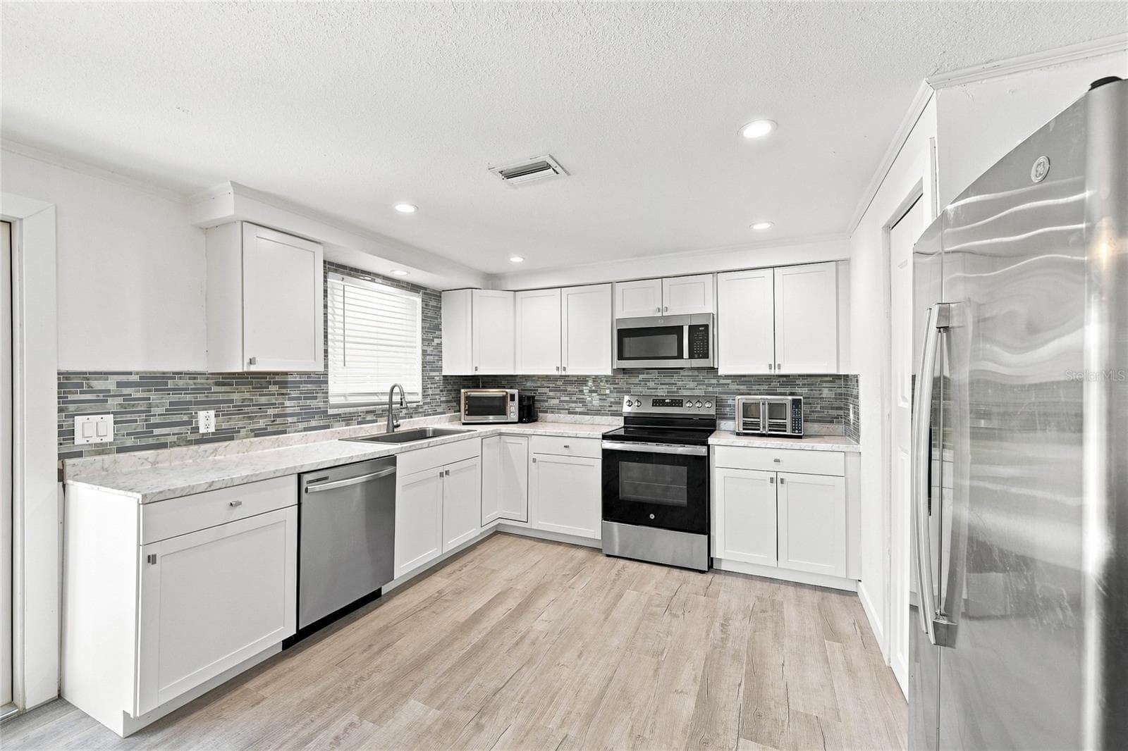 Single Family Residence at 457 GARFIELD AVE NW, PORT CHARLOTTE, photo 9 of 27
