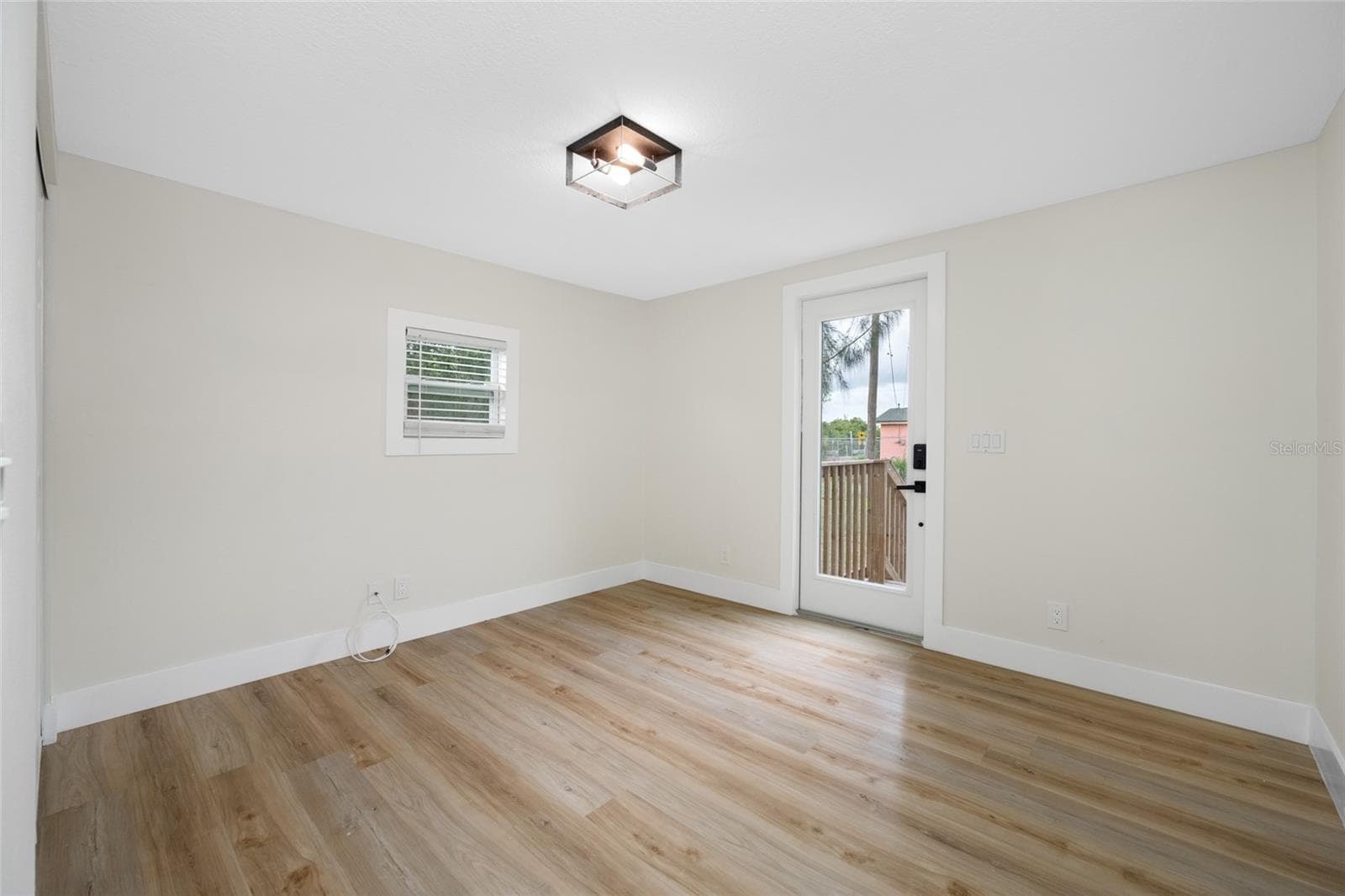 3rd Bedroom, office/den with access to the backyard. - 2547 KINGSTON ST S, ST PETERSBURG