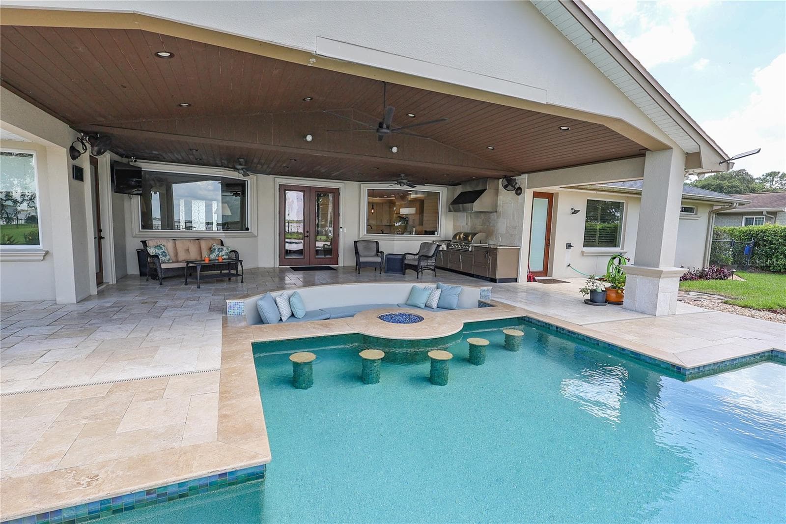 Swim up bar with gas fire-pit - 3640 CRUMP RD, WINTER HAVEN