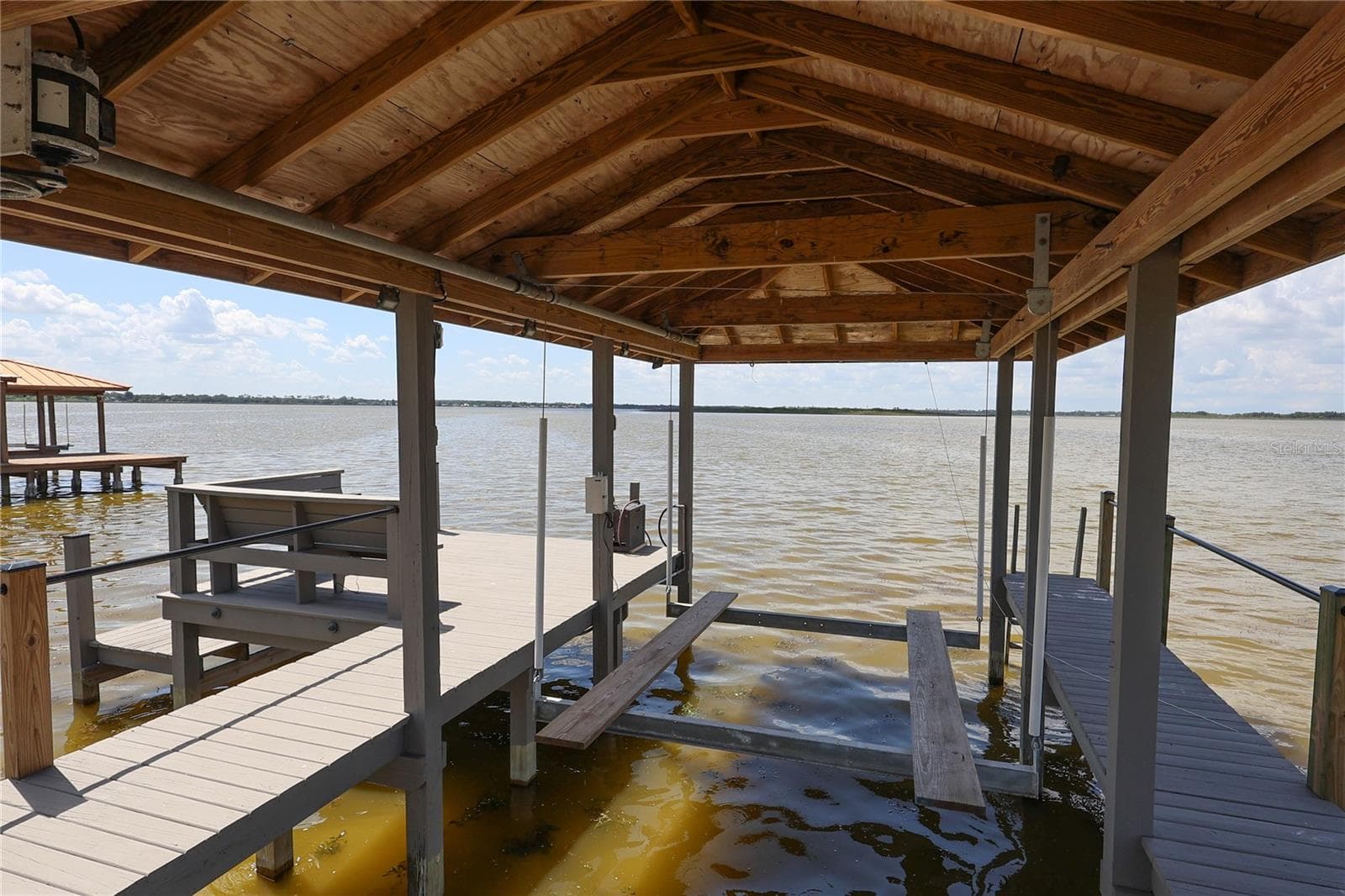 Dock with boat lift - 3640 CRUMP RD, WINTER HAVEN