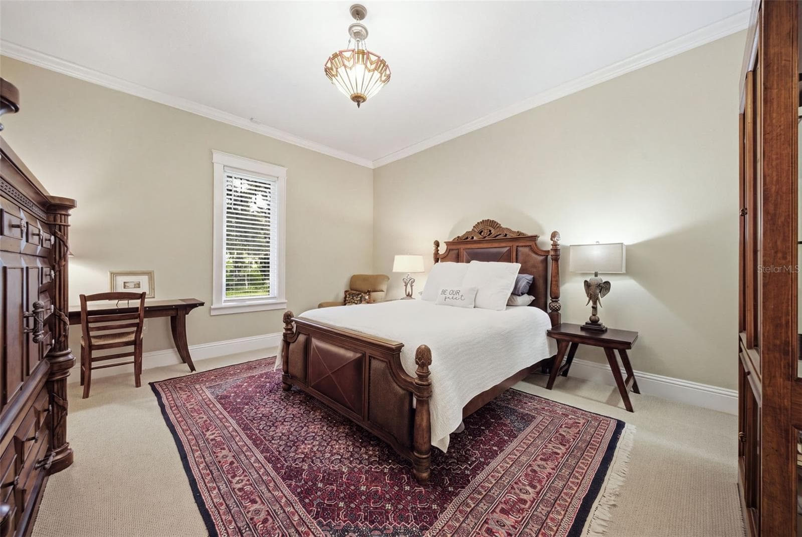 Guest room 1 with walk in closet. - 1905 PINE ST, VALRICO