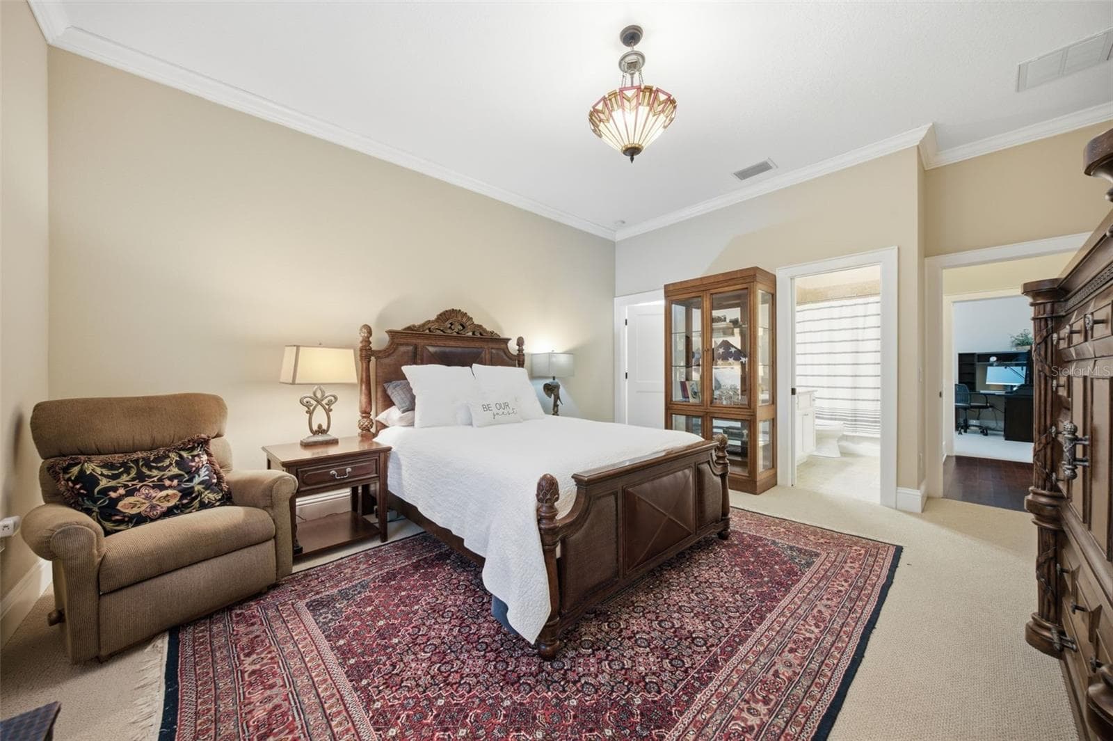 Guest room 1 with walk in closet. - 1905 PINE ST, VALRICO