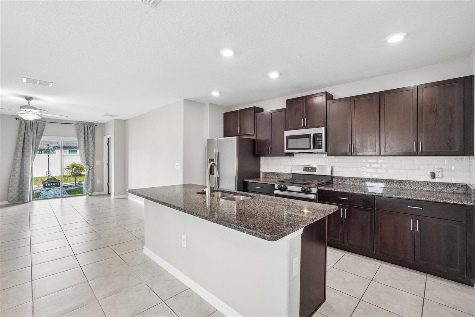 new ice-maker in fridge - 9663 CHANNING HILL DR, SUN CITY CENTER